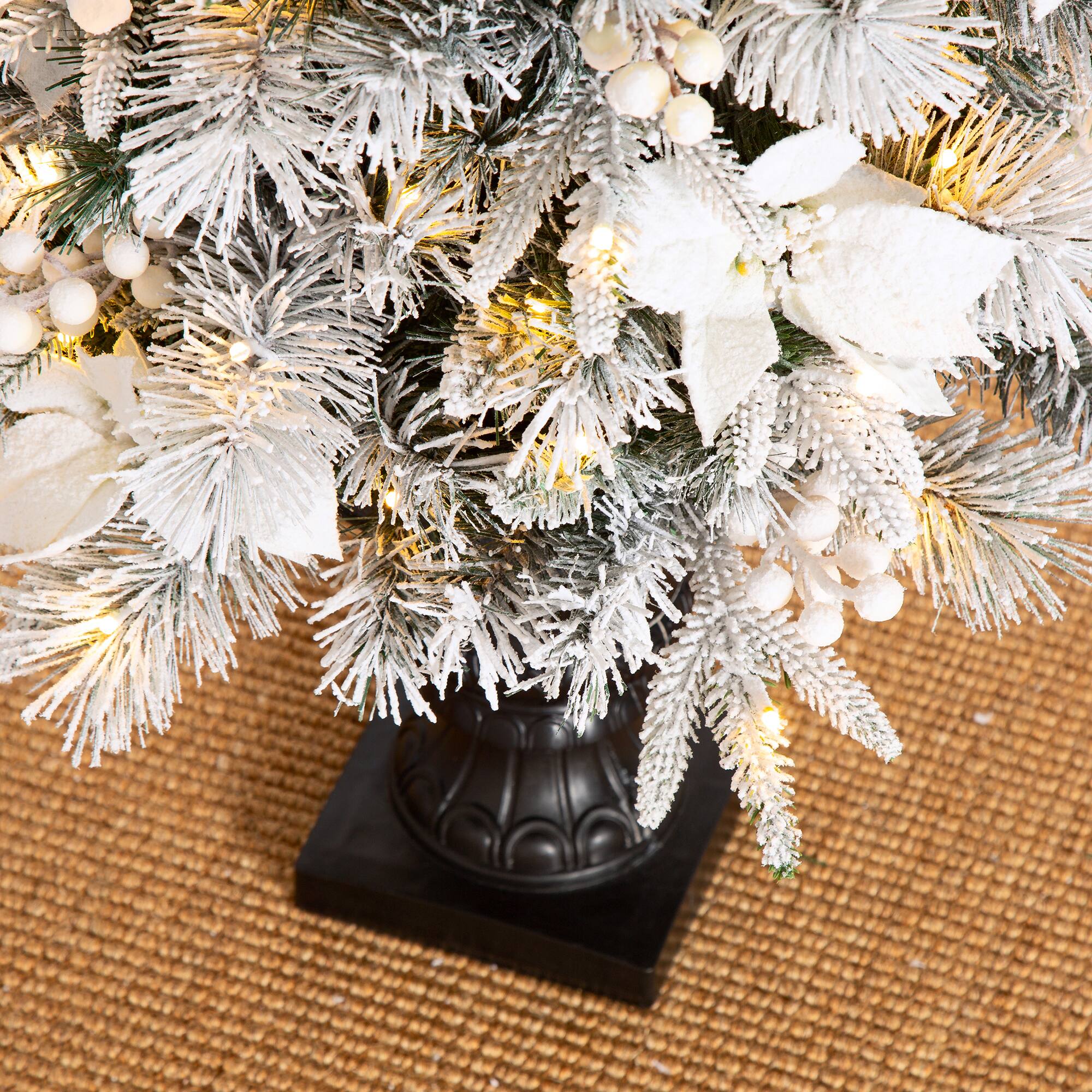 Alt View 9. Glitzhome - 5ft Pre-Lit Flocked Pine Artificial Christmas Porch Tree with 150 Warm White Lights and Poinsettia - White.
