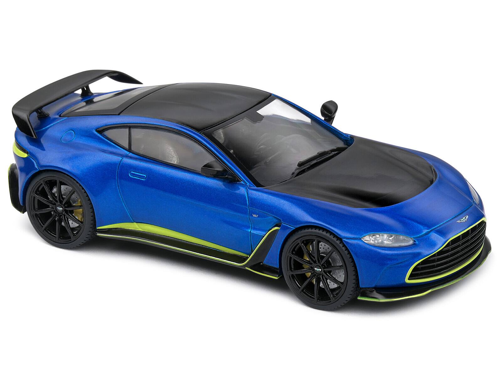 Back. Solido - Aston Martin V12 Vantage Blue Metallic with Black Hood and Top 1/43 Diecast Model Car by Solido - Blue Metallic And Black.