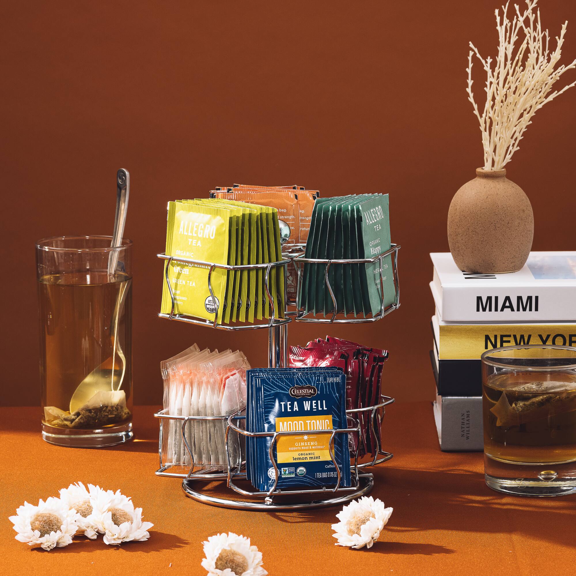 Sure, here is the corrected and grouped text from the image:

---

**ALLEGRO TEA**

- ORGANIC
- GREEN TEA

**TEA WELL MOON TONIC**

- GINSENG
- ORGANIC
- Herbal Infusion

**MIAMI**

**NEW YORK**

---

This text is derived from the visible labels and packaging in the image.