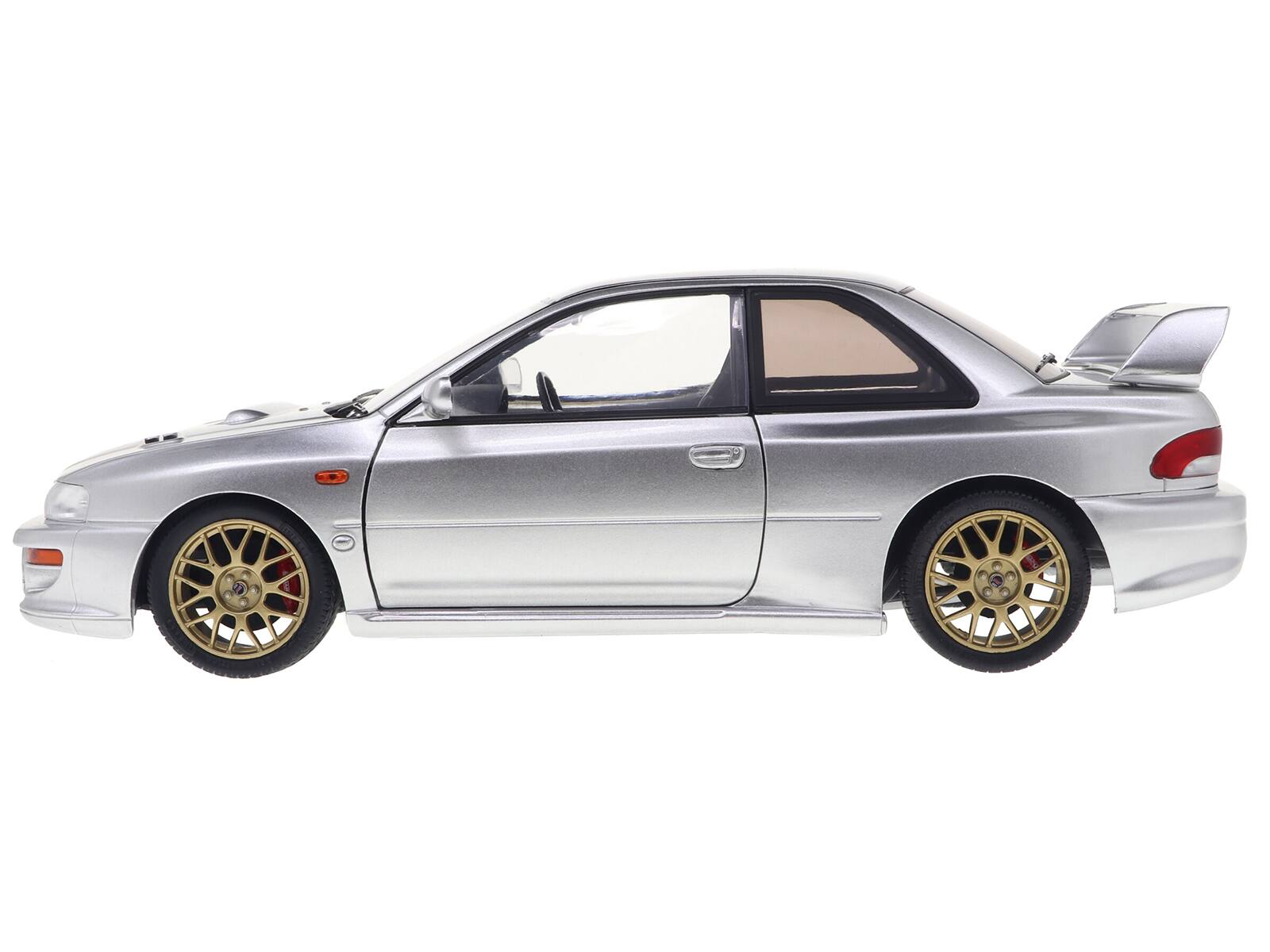 Back. Solido - 1998 Subaru Impreza 22B RHD (Right Hand Drive) Silver Metallic with Gold Wheels 1/18 Diecast Model Car by Solido - Silver Metallic with Gold.