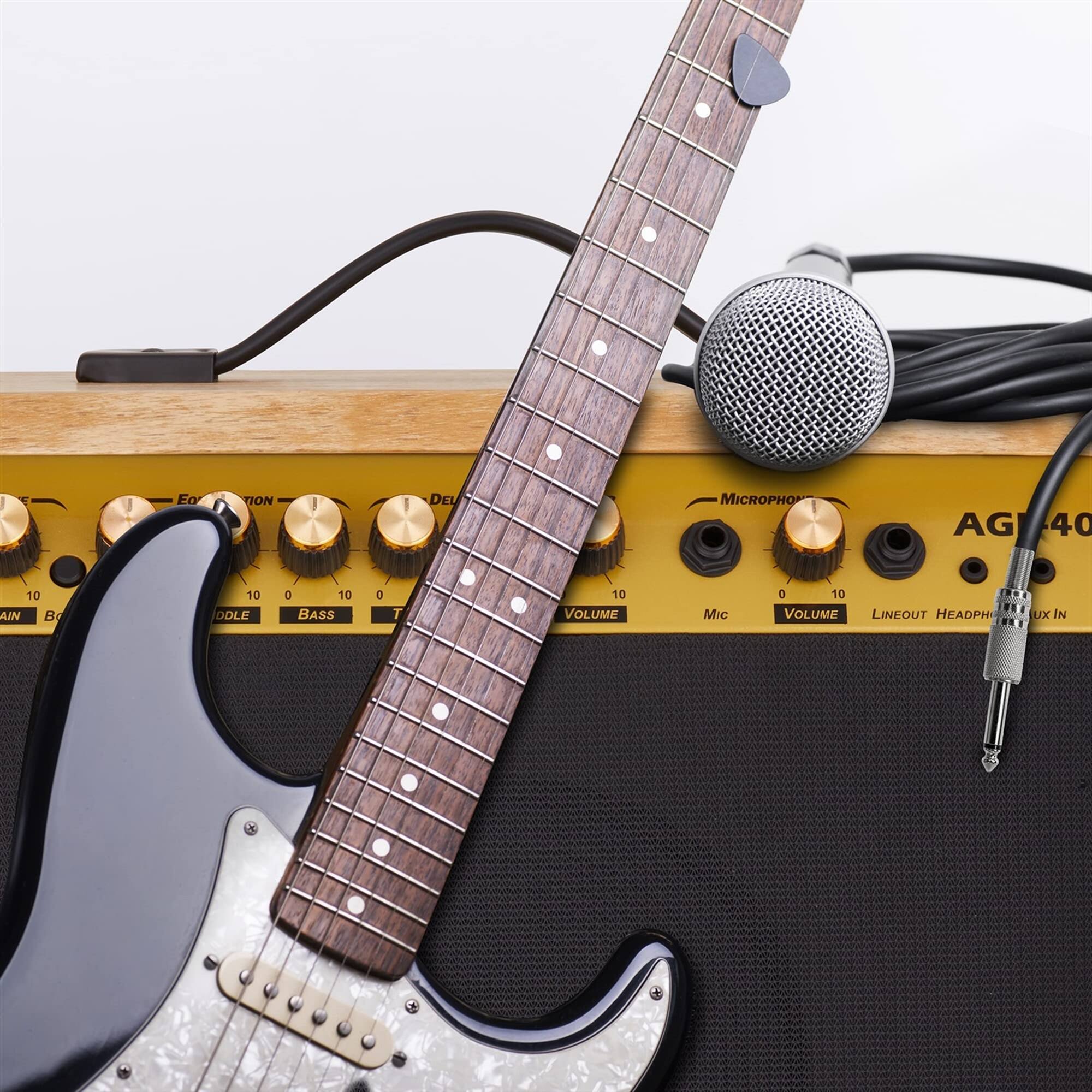 Ea ION DEL MICROPHO AG 40 10 AIN Bo 10 DDLE a 10 BASS D T 10 VOLUME Mic 0 10 VOLUME LINEOUT HEADPH UX IN