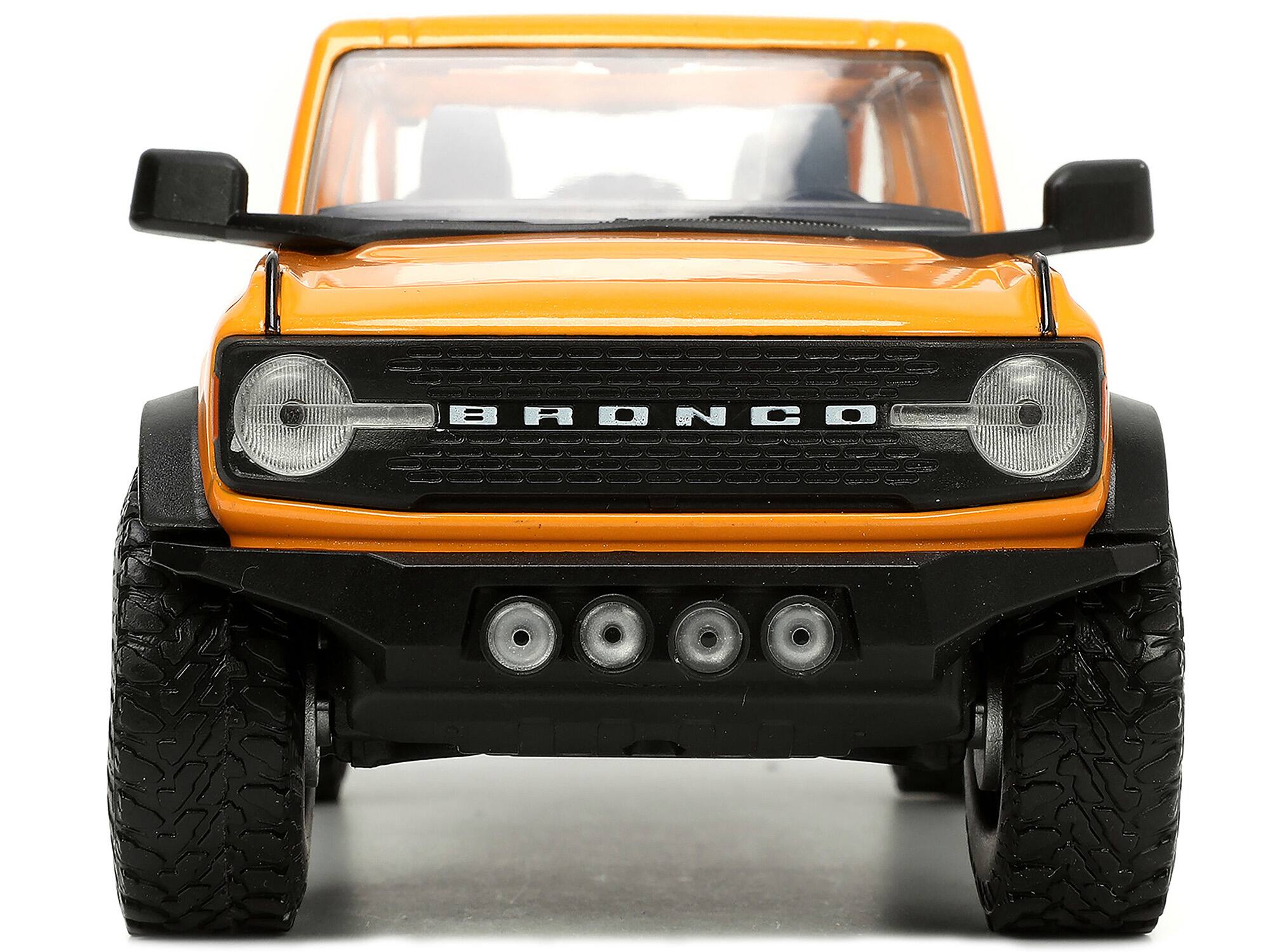 Alt View 4. Jada - 2021 Ford Bronco Orange Metallic with Extra Wheels "Just Trucks" Series 1/24 Diecast Model Car by Jada.