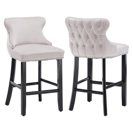 Front. HTUTWOO - Velvet Bar Stools Set of 2, Wingback Counter Height Chairs with Solid Wood Legs and Nailhead Trim for Kitchen Island - Beige.
