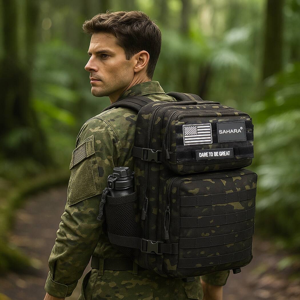 The man is wearing a backpack that says "SAHARA" and "DARE TO BE GREAT."