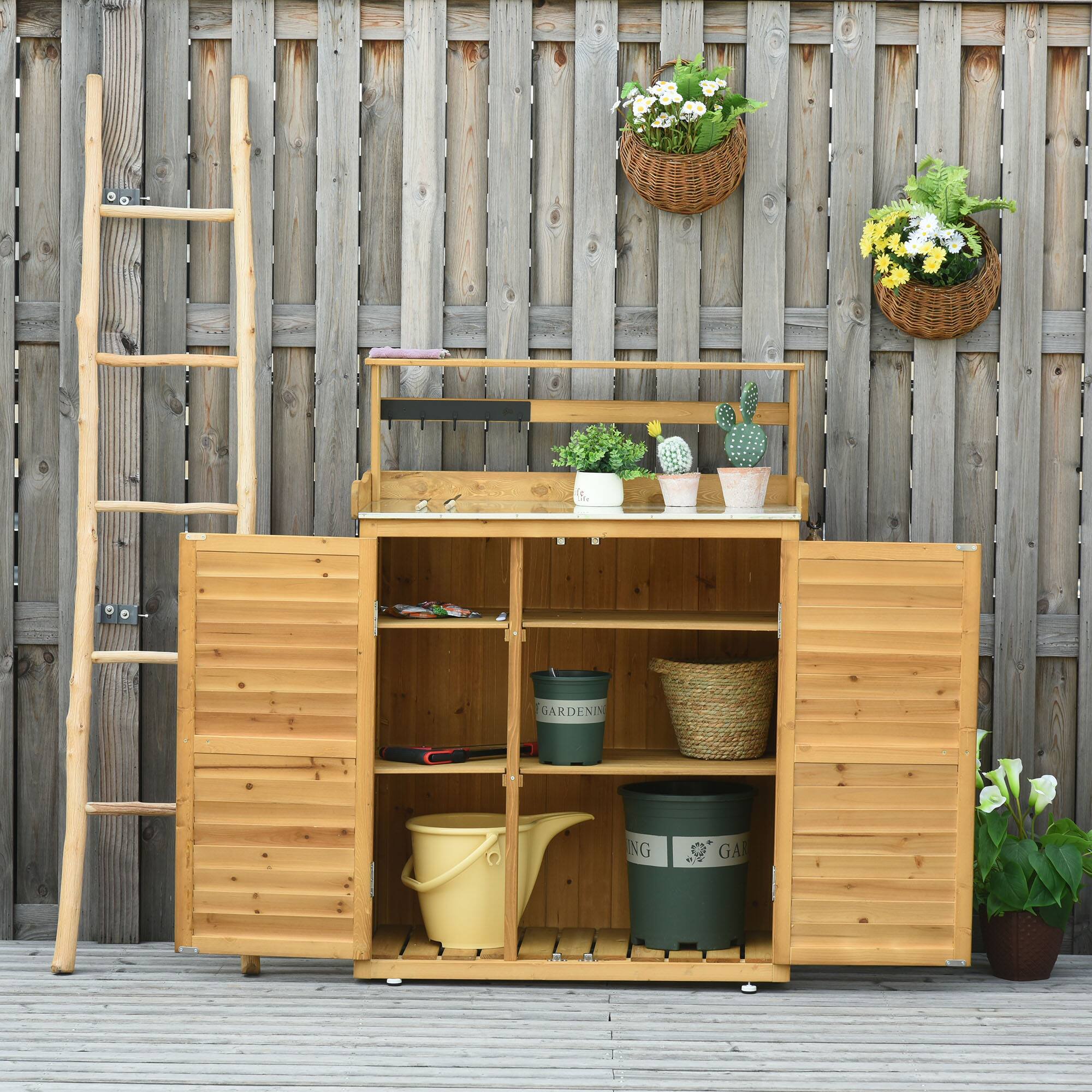 Angle. TinyHomie - Garden Potting Bench Table Wooden Workstation Shed with Tabletop Hooks 3-Tier Shelves Cabinet and 2 Magnetic Close Doors.