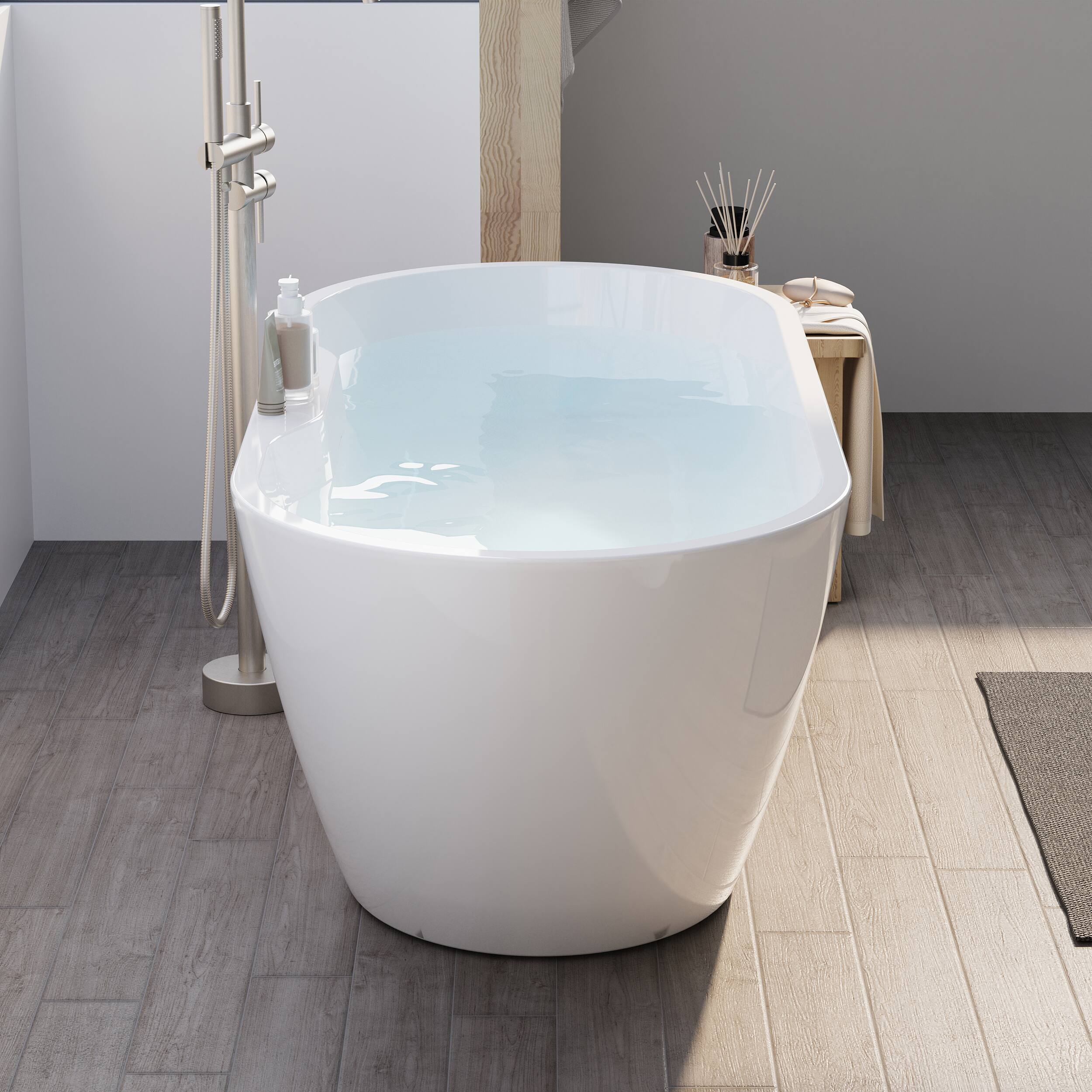 Angle. WELLFOR - Nava 65 in. x 29.5 in. Acrylic Oval Freestanding Soaking Bathtub with Center Drain and Widened Deck for Storage - White.
