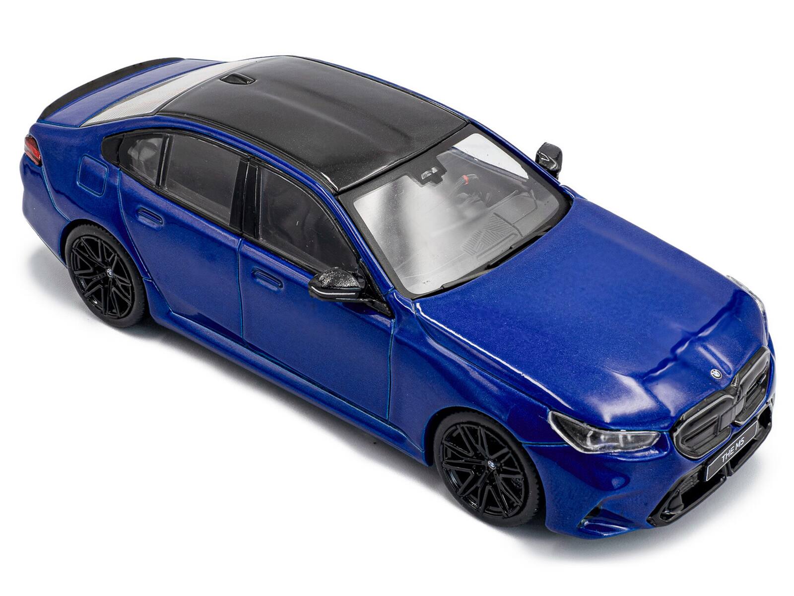 Alt View 5. Solido - 2024 BMW M5 Sedan Marina Bay Blue Metallic with Black Top 1/43 Diecast Model Car by Solido.