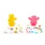 The text on the image reads "KCNE KE CHCER." However, it is unclear what the intended message is. The image features two teddy bears, one yellow and one pink, along with various other items such as a rainbow, a heart, and a cloud. The arrangement of these items suggests that they are part of a craft or art project.