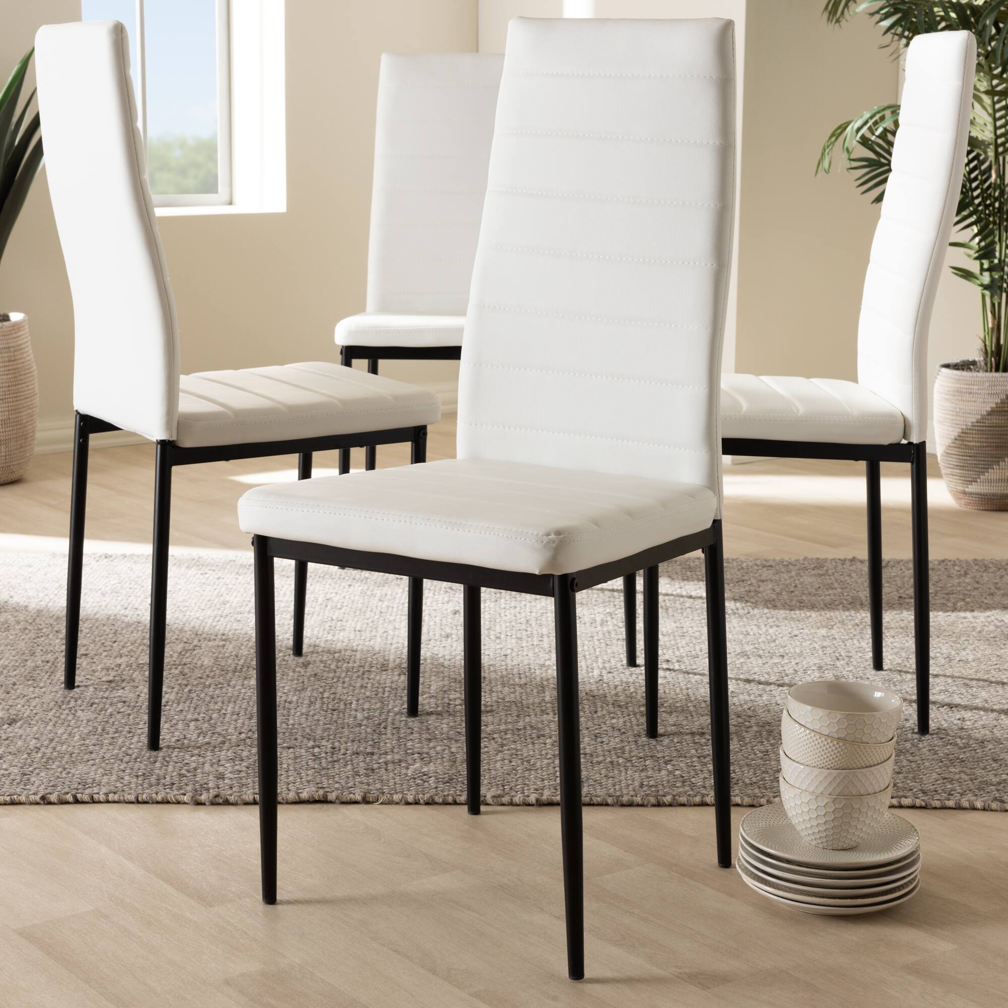 Left. Baxton Studio - Set of 4 Armand Modern and Contemporary Faux Leather Upholstered Dining Chairs - White.