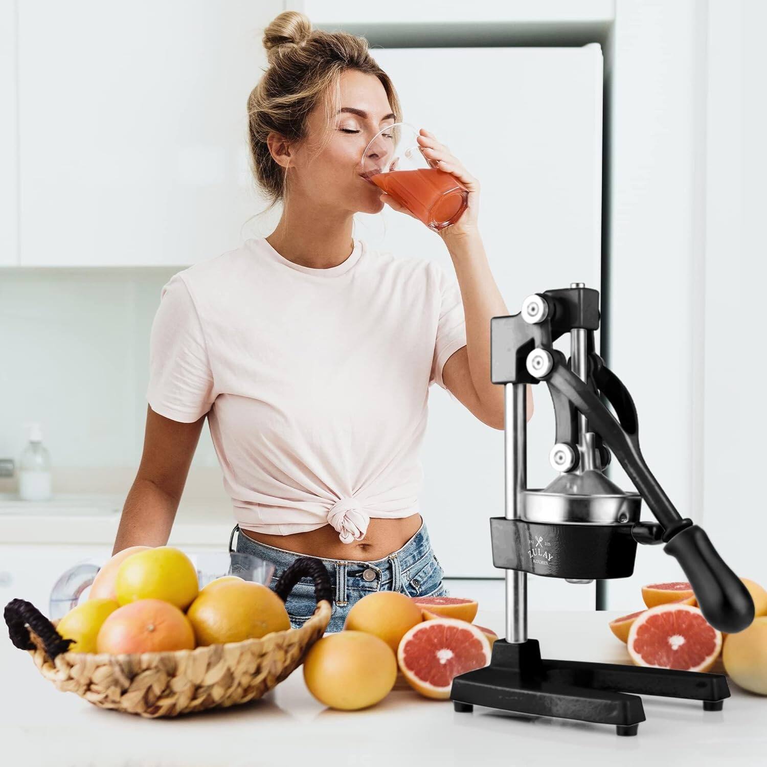 Left. Zulay Kitchen - Zulay Kitchen Cast Iron Citrus Press Juicer w/ Stainless Steel Lemon Squeezer - Black.