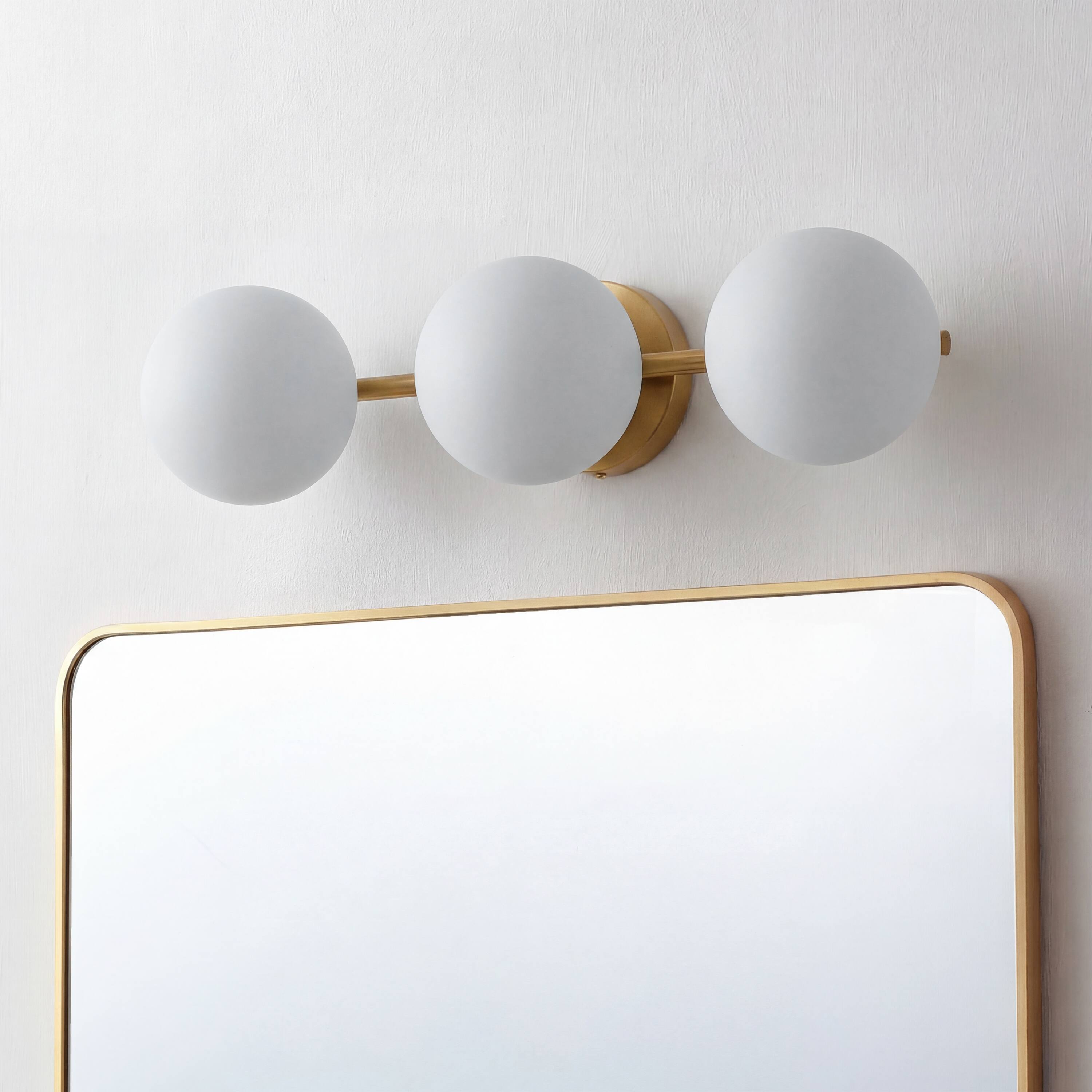 Alt View 7. Jonathan Y - Nash 23" Mid-Century Modern Brass Gold 3-Light Metal Vanity Light with White Glass Globe Shades Wall Sconce - Brass Gold.