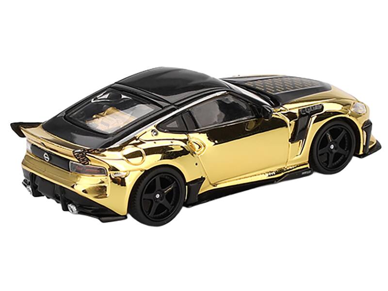 Left. Mini GT - Nissan Z VeilSide FFZ400 Gold Chrome with Black Top Limited Edition 1/64 Diecast Model Car by Mini GT - Gold Chrome with Black.