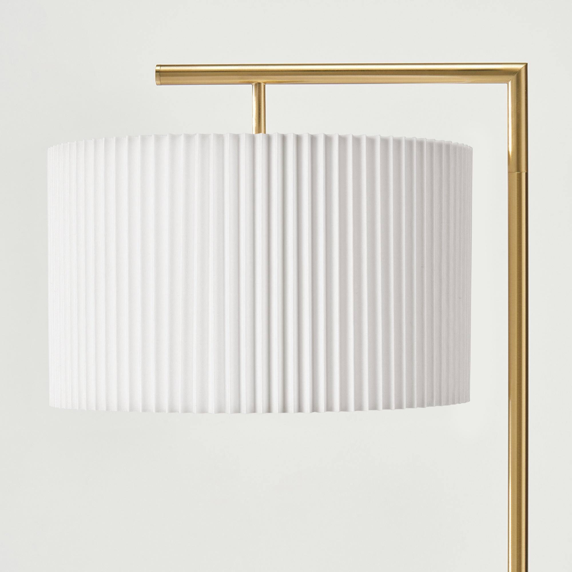 Back. Brightech - Montage Modern LED Midcentury Modern Arc Super Bright Floor Lamp with White Fabric Drum Shade - Antiqued Brass.