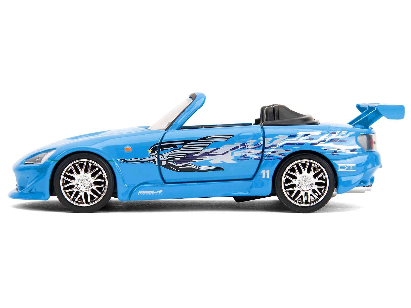 Alt View 2. Jada - 2001 Honda S2000 Convertible Blue with Graphics "Fast & Furious Remix - 25th Anniversary" Series  1/32 Model Car by Jada - Multicolor.