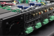 The text on the image reads: "STERED BC- BC R L A ar A LINE OUT D WIRING INPUT FOR PROPER A DIGITAL MANUAL OFF OWNER'S ON 364 ZONE ATTENTION:SEE OFF BRIDGED ON 182 ZONE BRIDGED O R BRCA R BRIL +". The corrected text is: "STERED BC- BC R L A ar A LINE OUT D WIRING INPUT FOR PROPER A DIGITAL MANUAL OFF OWNER'S ON 364 ZONE ATTENTION: SEE OFF BRIDGED ON 182 ZONE BRIDGED O R BRCA R BRIL +".