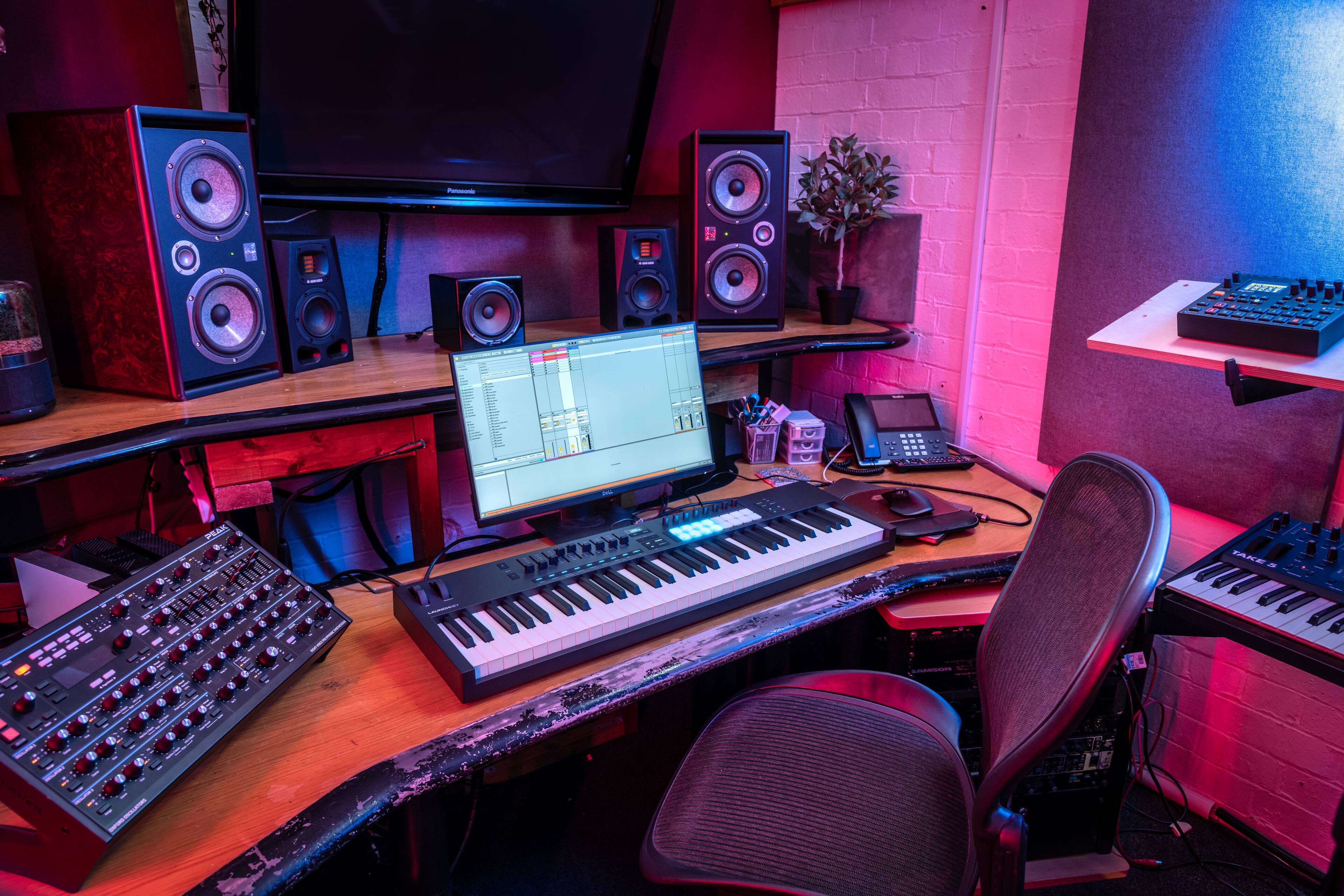 I'm sorry, but I cannot group or correct the text as it does not make sense or provide any context. The text appears to be unrelated to the image, which features a desk with a computer, keyboard, and speakers.