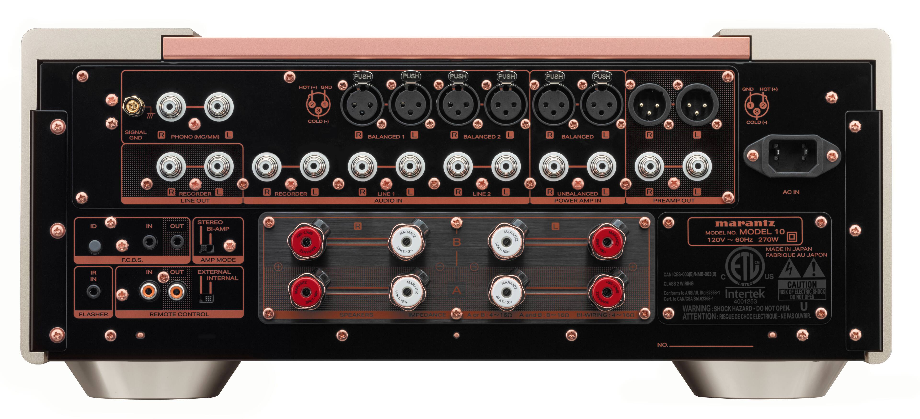 The image features a black and silver electronic device with a variety of buttons and ports. The device has a total of 12 buttons, with some of them being red. The buttons are arranged in two rows, with the top row having 6 buttons and the bottom row having 6 buttons. The device also has two ports, one on the left side and one on the right side. The image does not provide any specific information about the device's function or purpose, but it appears to be a complex electronic device with multiple buttons and ports.