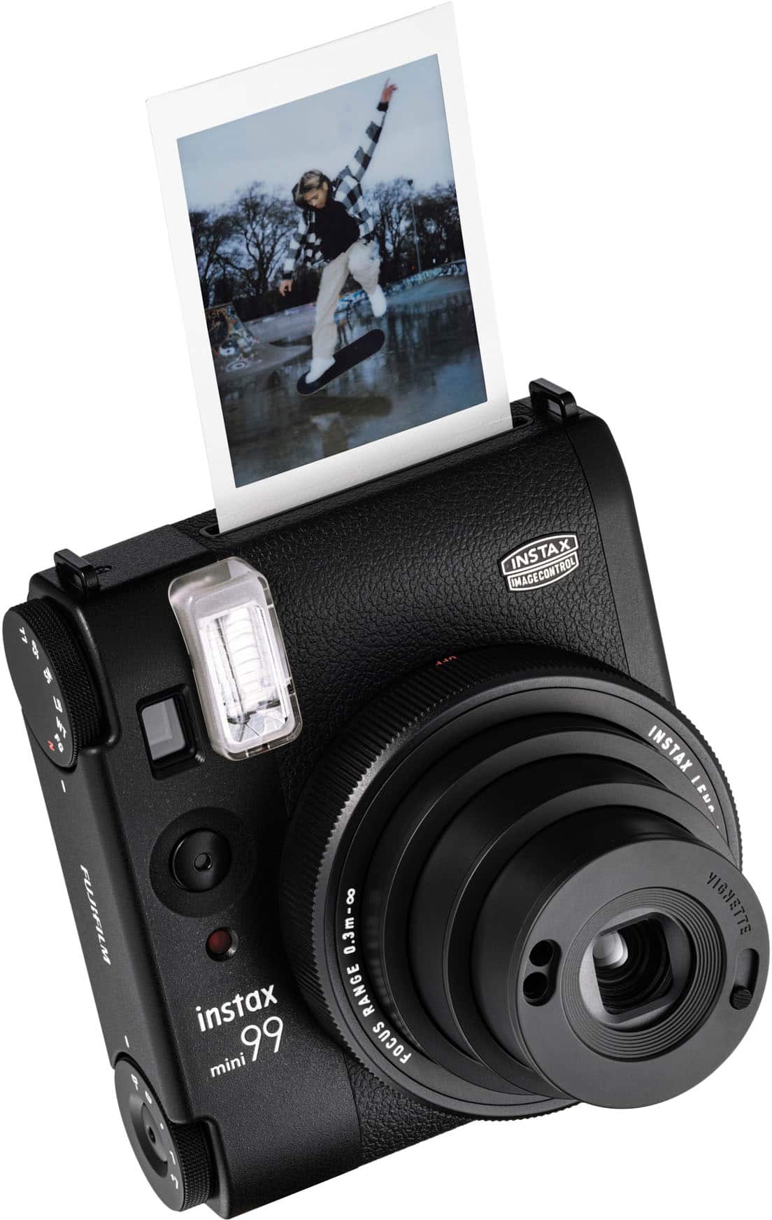 The text on the image reads: "instax mini 99 | 0.3m - 0.9m | range focus | instax lens | image control."