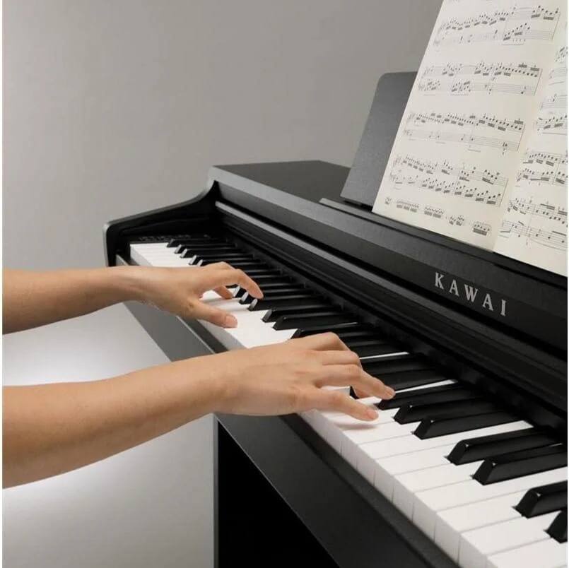 Left. Kawai Pianos - Kawai KDP75 Digital Home Piano - Embossed Black.