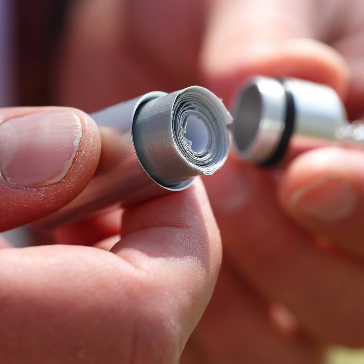 Alt View 1. Coghlan’s - Coghlan's Aluminum Capsule with Carabiner, Watertight Seal - Small .8 x 2.44 in" - Silver.