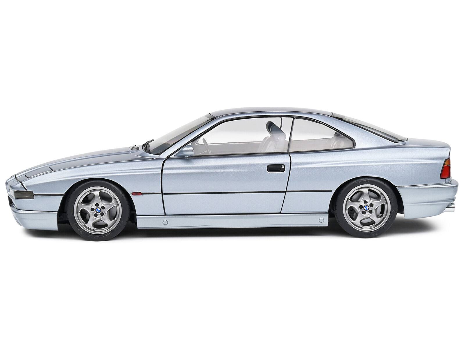 Left. Solido - 1992 BMW 850 (E31) CSI Arctic Silver Metallic 1/18 Diecast Model Car by Solido - Silver Metallic.