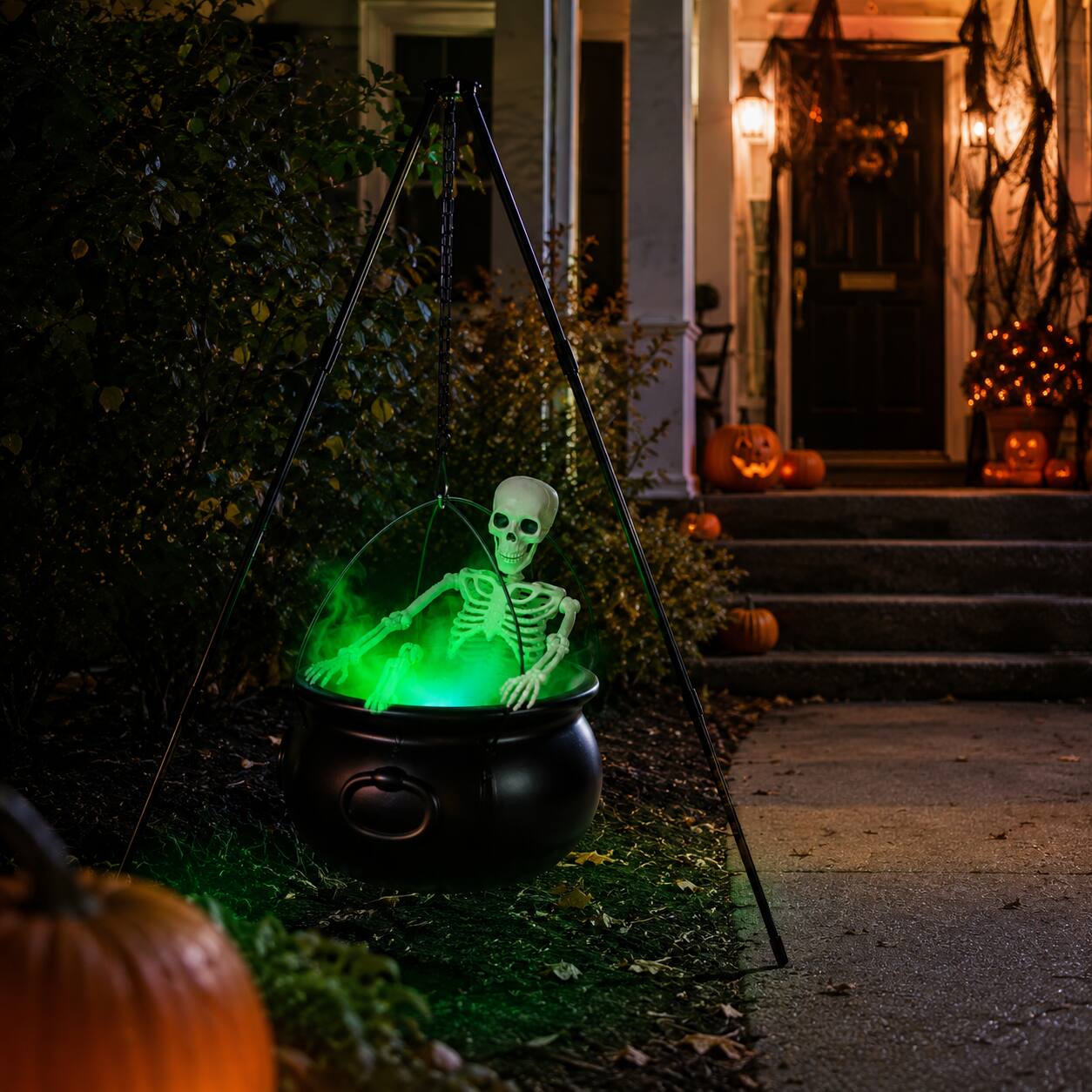 Alt View 4. FASCINATE - 52-in Lighted Witch Cauldron Tripod with Skeleton, Green LED Fog Maker and Splash Guard - Black.