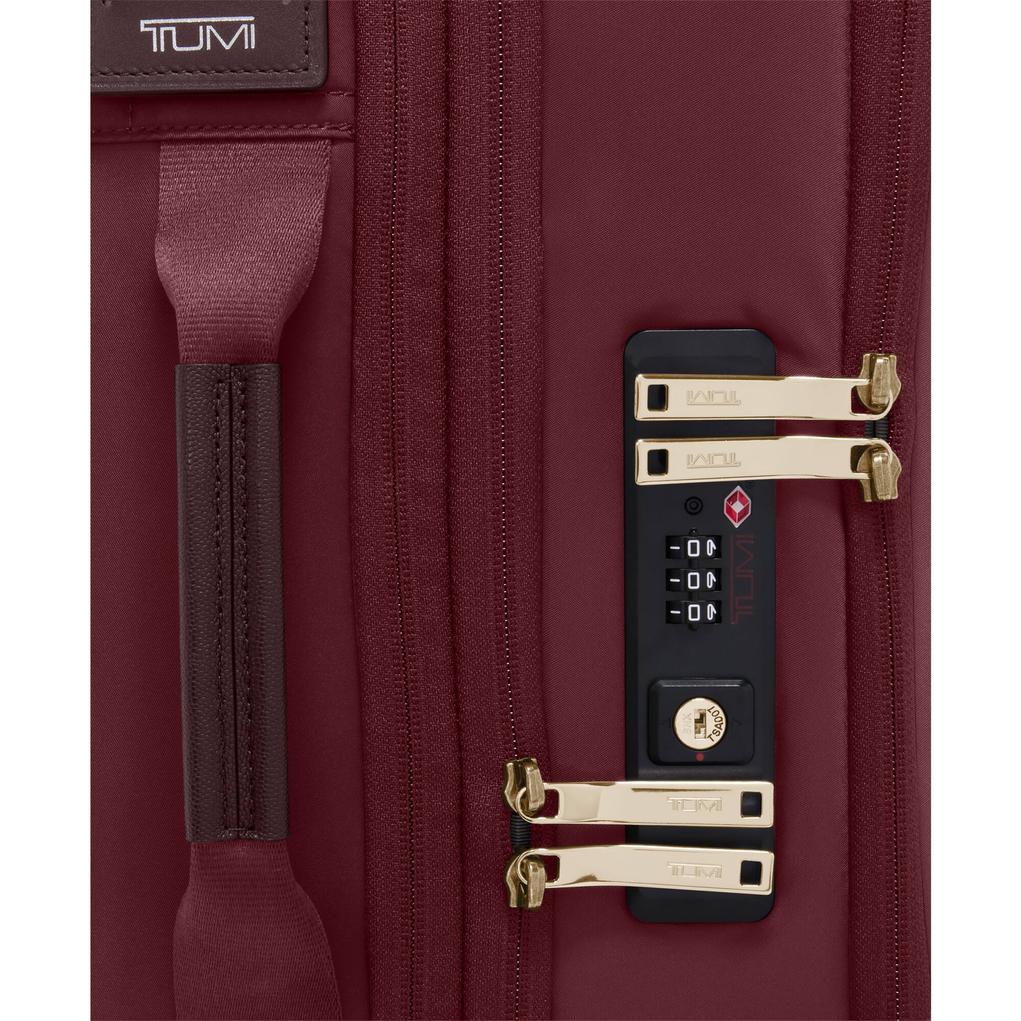 The text on the image is: "TUMI".