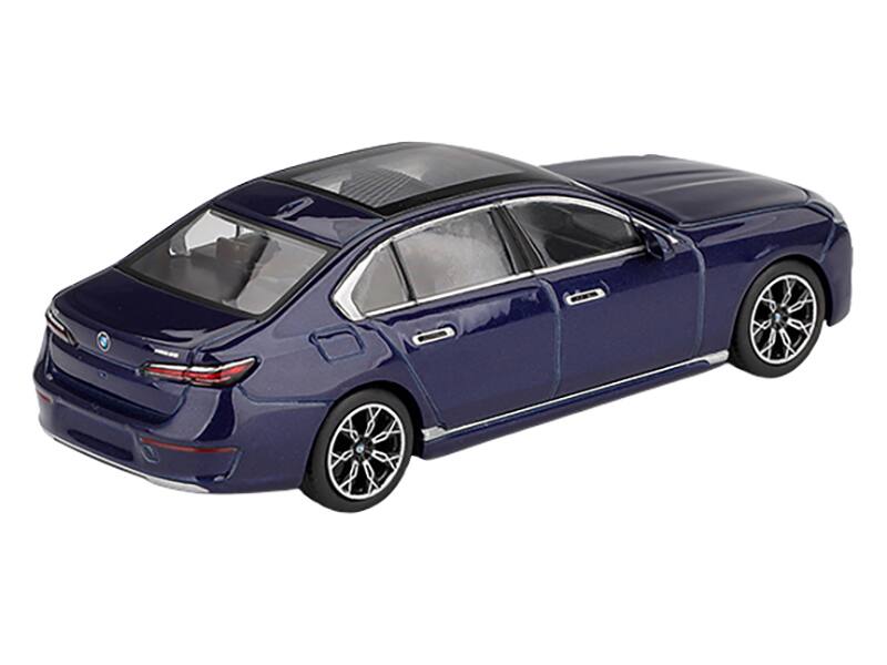 Left. Mini GT - BMW i7 xDrive60 Tanzanite Blue Metallic with Sun Roof Limited Edition 1/64 Diecast Model Car by Mini GT - Blue Metallic.