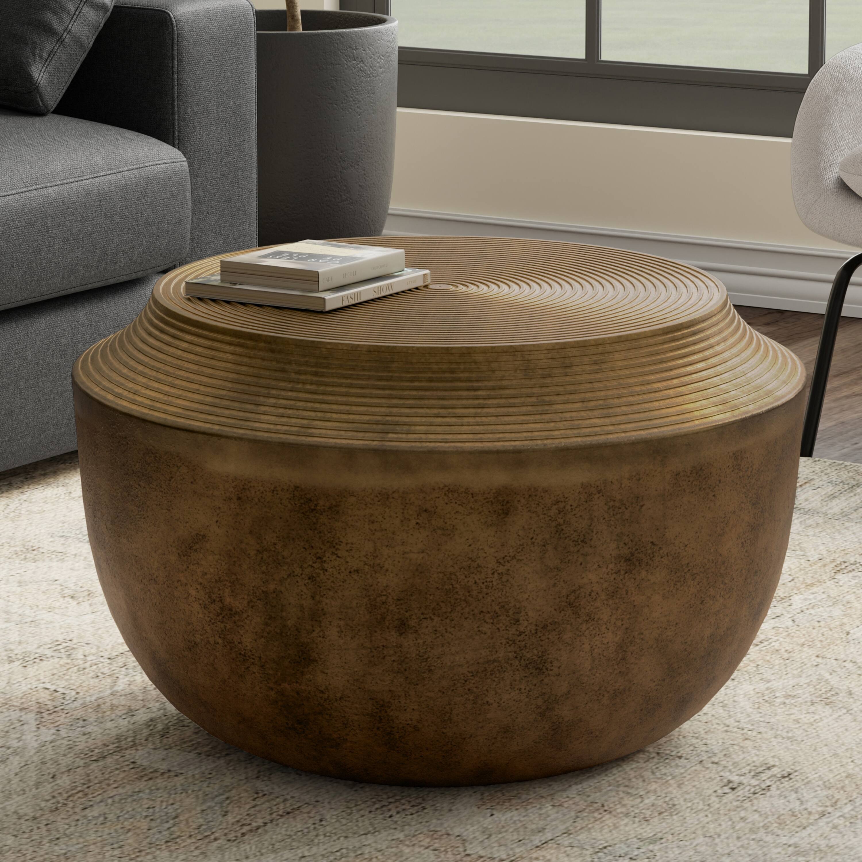 Angle. Simpli Home - Timmons 21 inch Wide Round Contemporary Cast Aluminum Coffee Table in Antique Brass, Fully Assembled - Antique Brass.