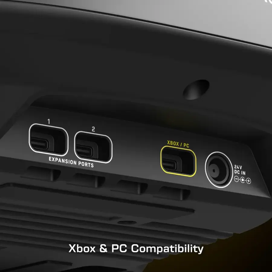The text on the image reads: "1 2 XBOX I PC EXPANSION PORTS 24V DC IN + Xbox & PC Compatibility."