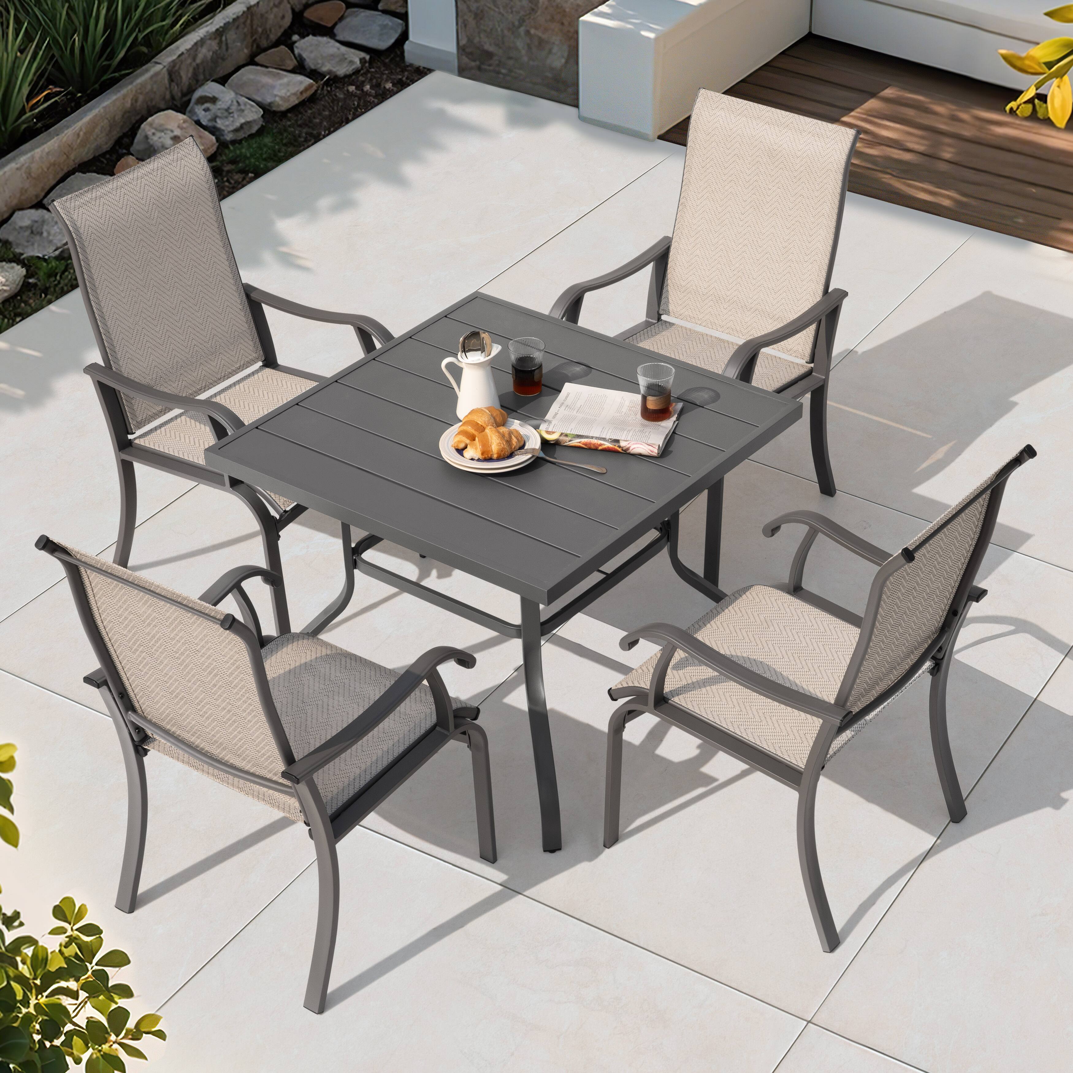 Angle. Nuu Garden - Patio Metal Textilene Dining Set of 5 with Umbrella Hole and High Backrest - Beige and Gray.