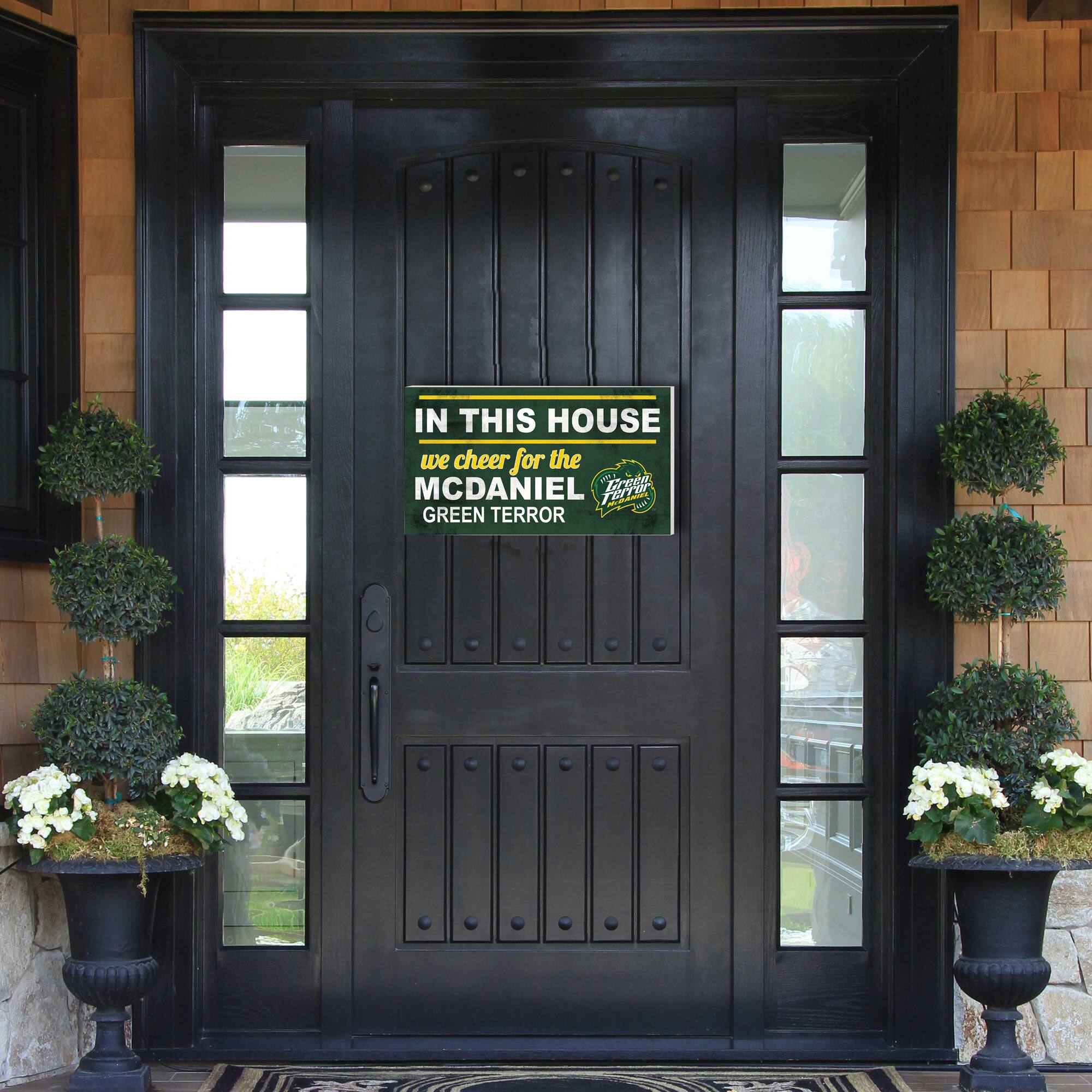 IN THIS HOUSE  
we cheer for the  
MCDANIEL  
GREEN TERROR