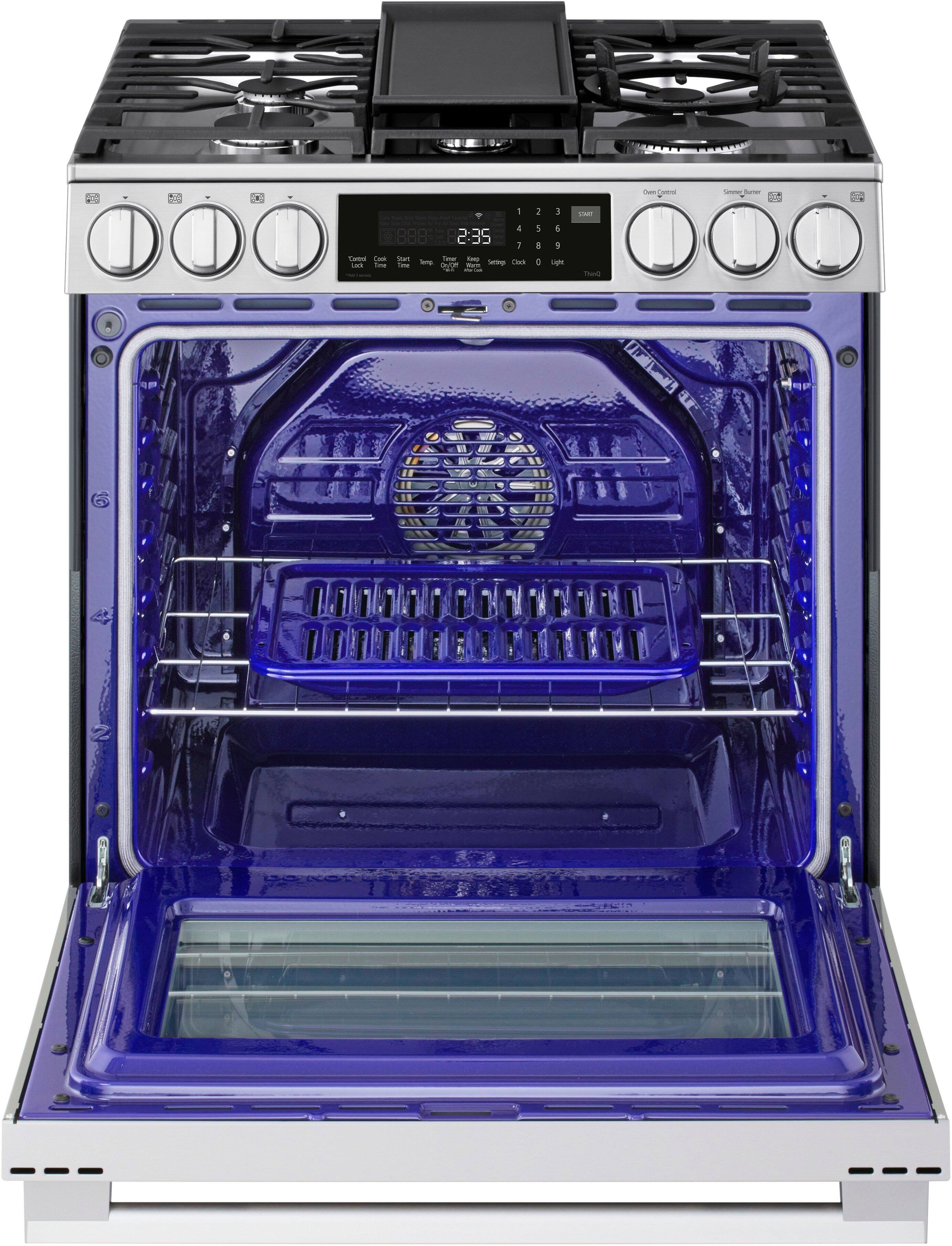 The oven is blue and white, and it has a digital clock on the front. The clock displays the time as 2:35.