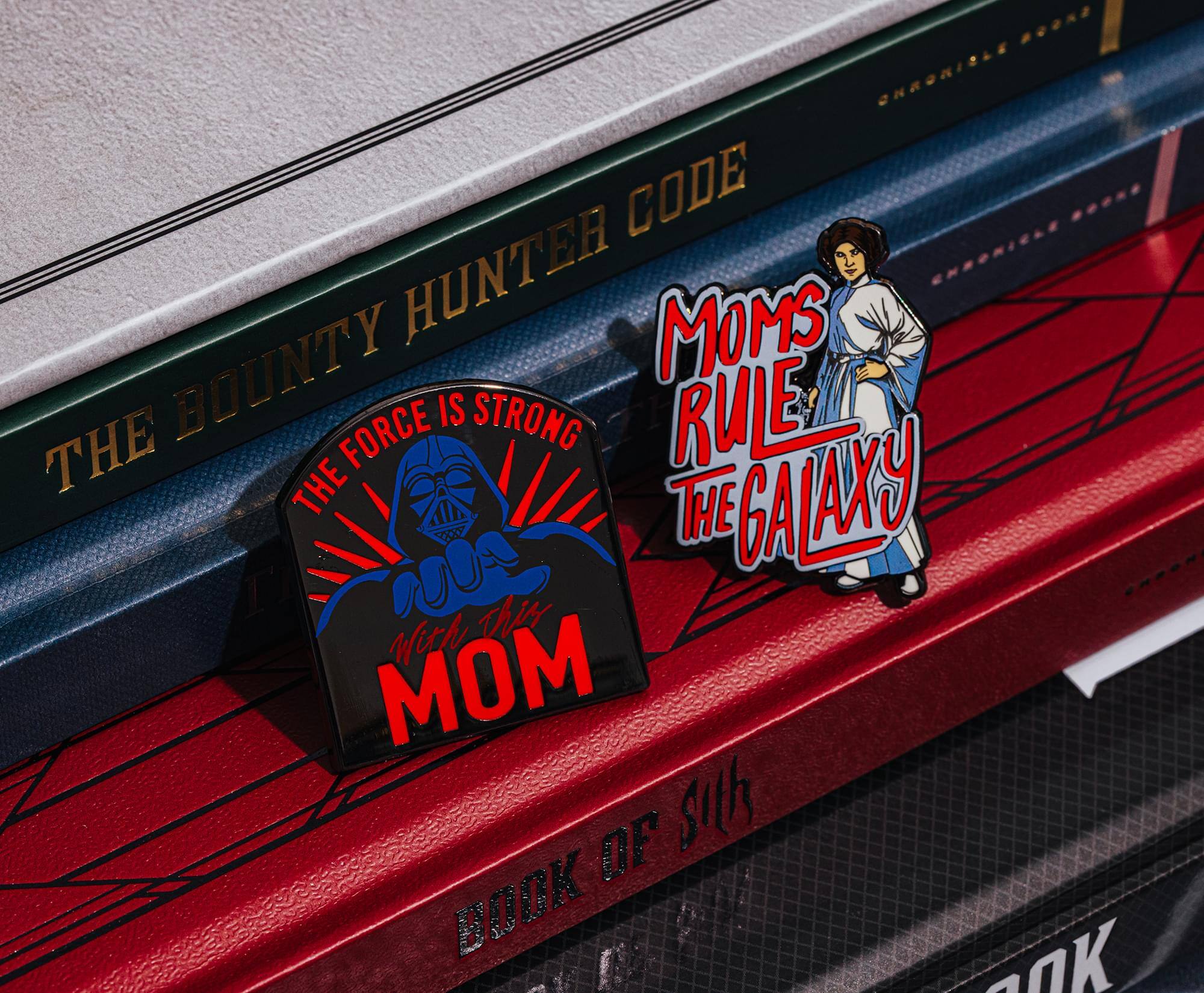 BOON2 CNRONISLE CODE HUNTER ENRORICAE BOUNTY MOMS IS STRONG RULE THE FORCE THE THE GALAXY With hs MOM OF sith BOOK SOK

Corrected:  
THE BOUNTY HUNTER CODE  
THE FORCE IS STRONG WITH THIS MOM  
MOMS RULE THE GALAXY