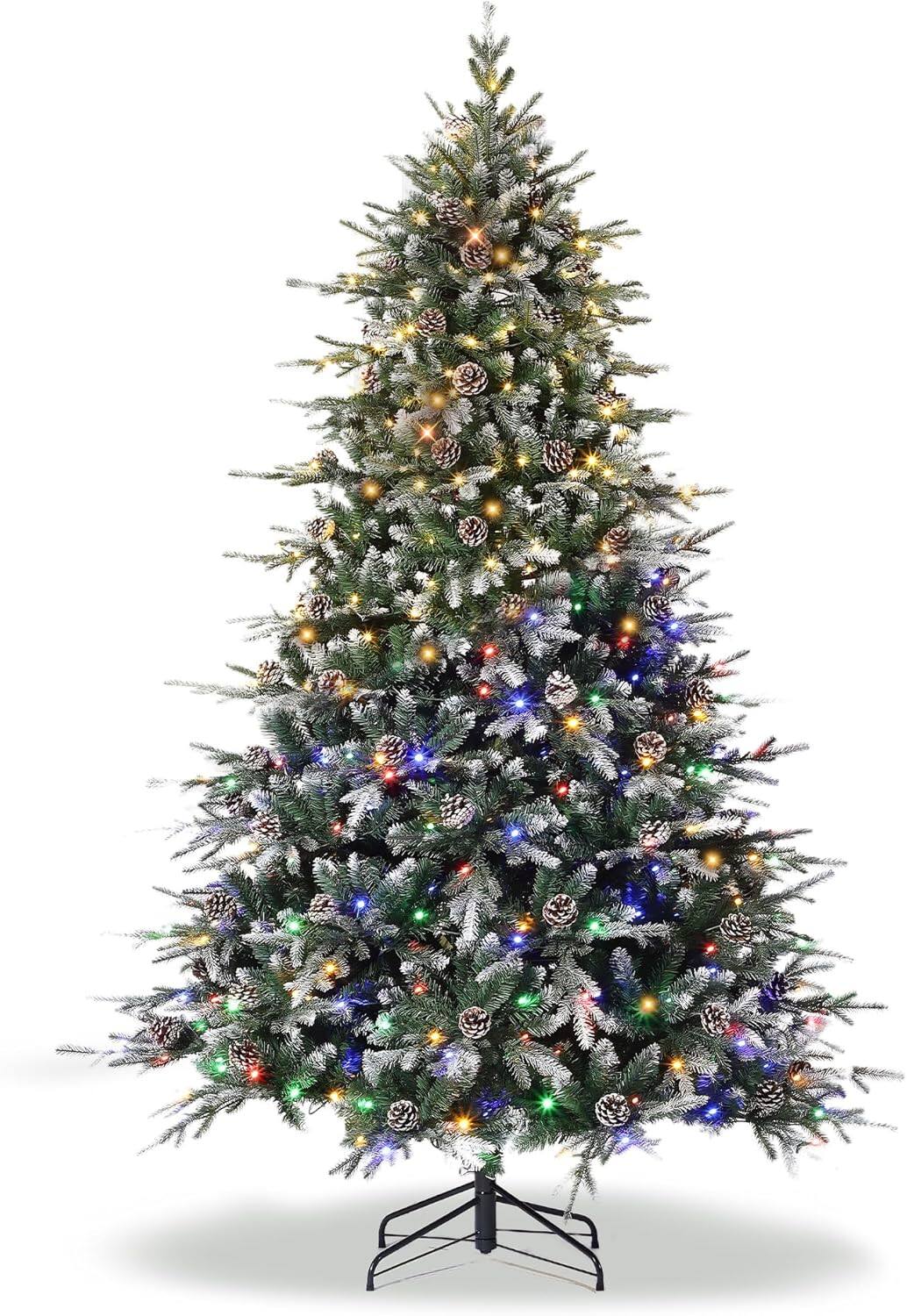 Left. Maxxis Merch - 6FT Pre-Lit Snow-Flocked Christmas Tree, 300 LED Lights, Pine Cones & Gloves, Folding Stand, Home D茅cor - Green.