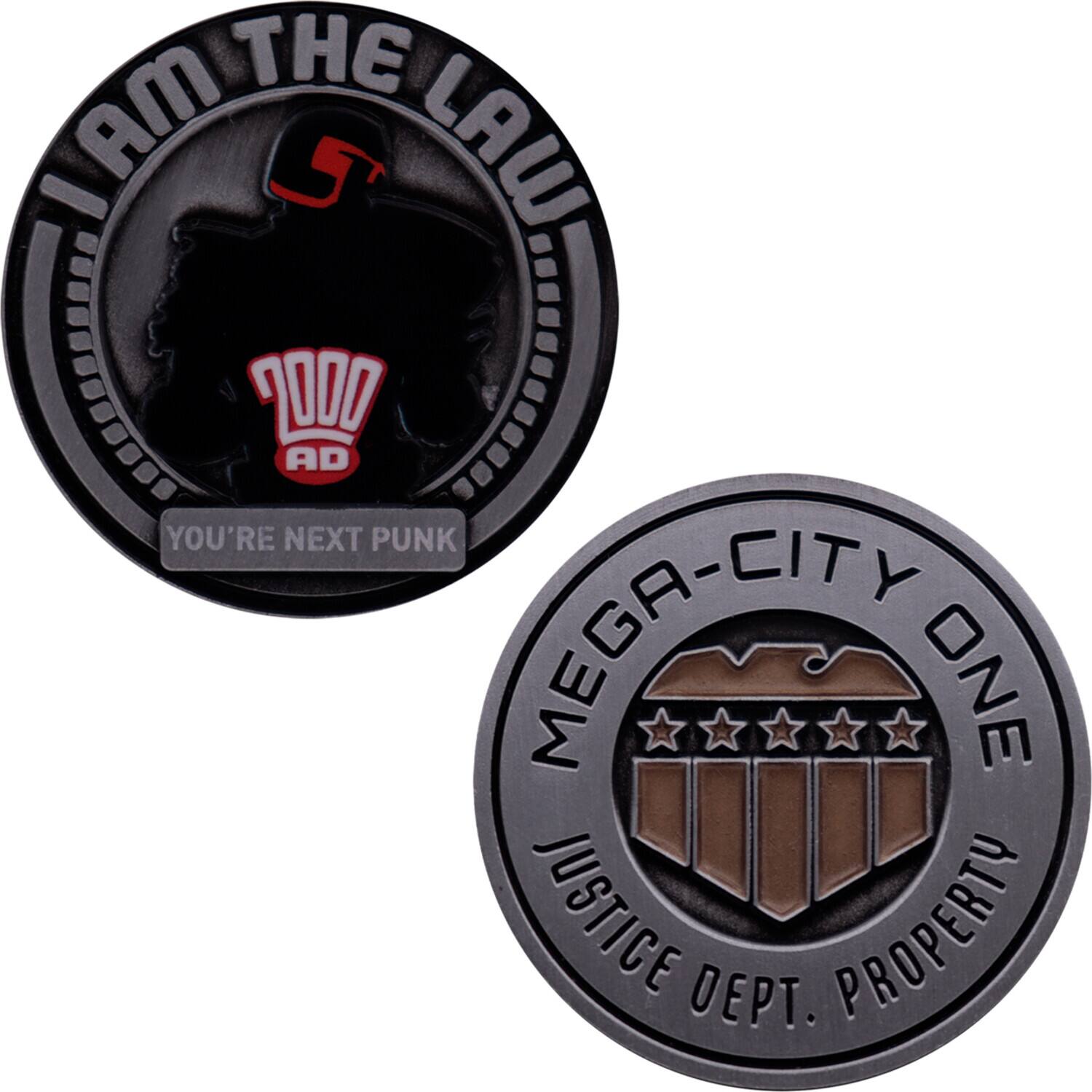 Sure, here is the corrected and grouped text from the image:

**Top Coin:**
- "I AM THE LAW"
- "2000 AD"
- "YOU'RE NEXT PUNK"

**Bottom Coin:**
- "MEGA-CITY ONE"
- "JUSTICE DEPT. PROPERTY"
