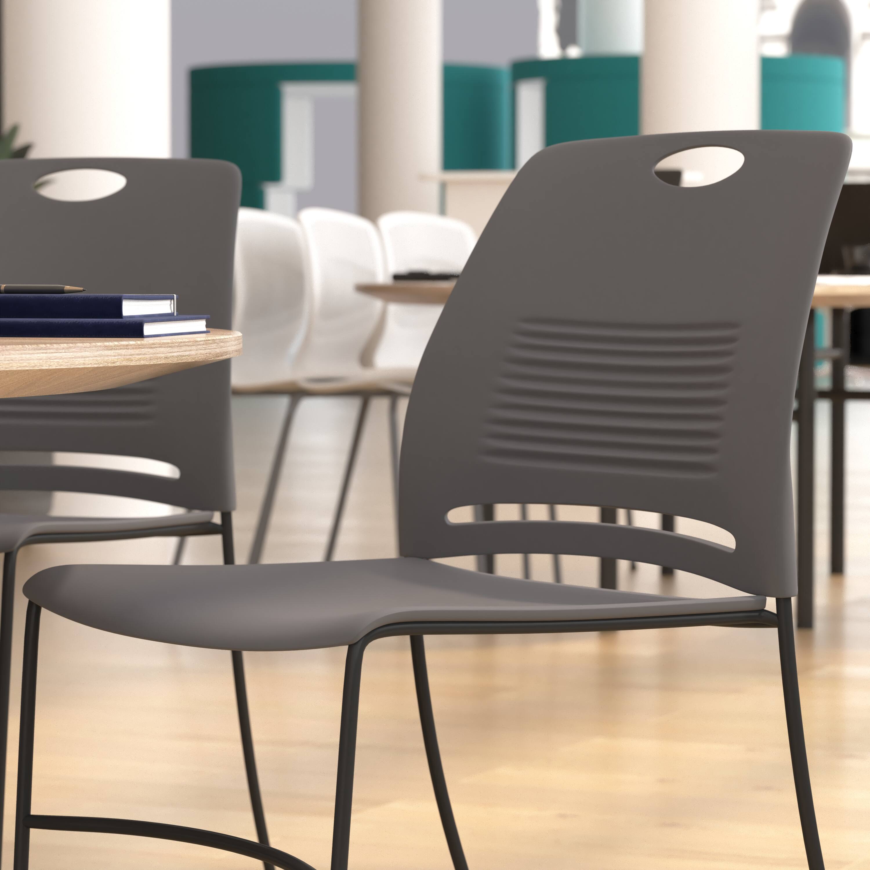 Alt View 4. Emma + Oliver - Heavy Duty 660 lb. Capacity Plastic Stack Chair with Steel Sled Base Frame - Gray.