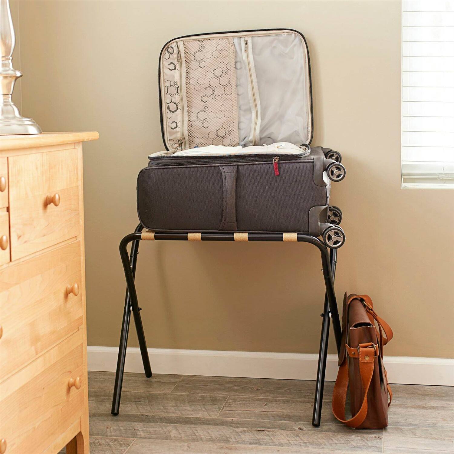 Angle. Hivvago - Black Metal Folding Luggage Rack with Khaki Fabric Straps - Black.