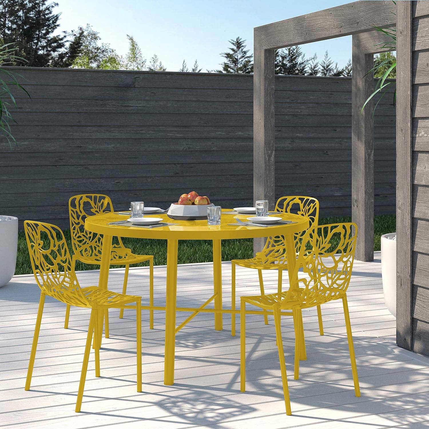 Angle. LeisureMod - Devon (Set of 4) Modern Floral Stackable Aluminum Chair - Weather Resistant Indoor/Outdoor Dining Chair - Yellow.