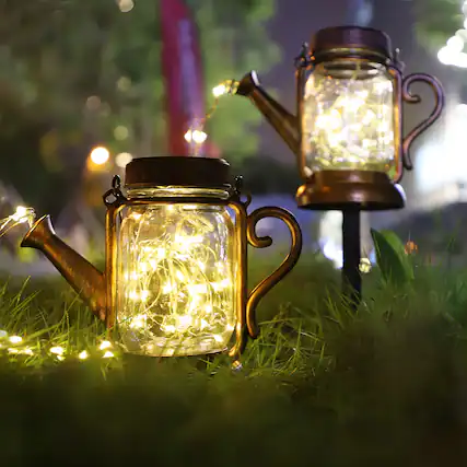 Front. Oumilen - 2-in-1 Solar Watering Can Fairy Lights – Warm White Waterfall String Light, IP44 Waterproof for Yard Garden.
