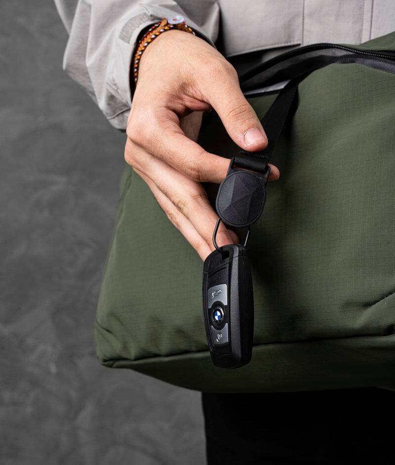 Alt View 2. ALPAKA - Laptop Messenger Satchel Bag 11L for Work & Travel, Fits 13" MacBook Air, Bottle Pockets, Luggage Pass-Through - Green Axoflux 210D.