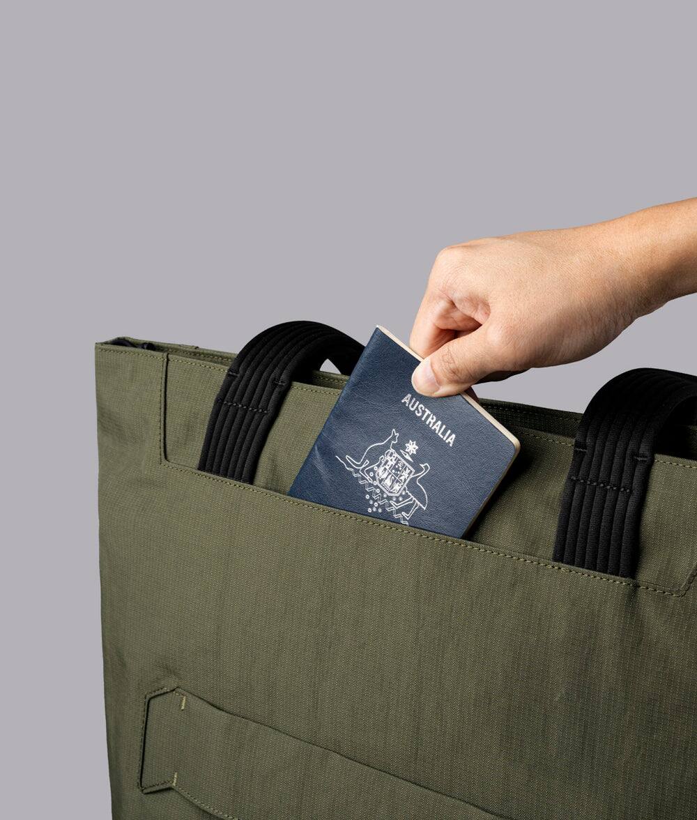 Alt View 5. ALPAKA - Flight Tote (L) Laptop Tote Bag for Work, Large Tote Bag Fits 16" MacBook Pro, Water Bottle Pocket, Luggage Pass-Through - Green Axoflux 400D.