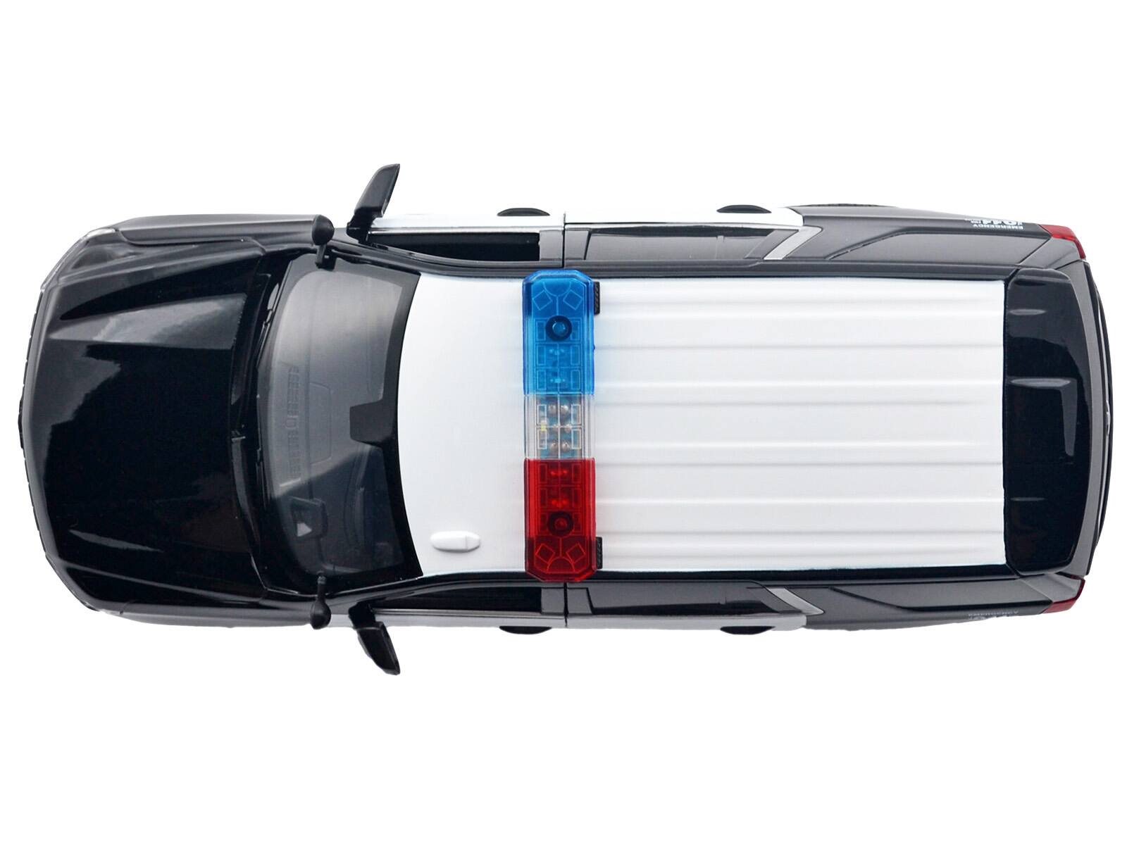 Alt View 4. Motormax - 2025 Chevrolet Tahoe PPV "LAPD" Black and White with Light Bar and Lights and Sounds 1/24 Diecast Model Car by Motormax.