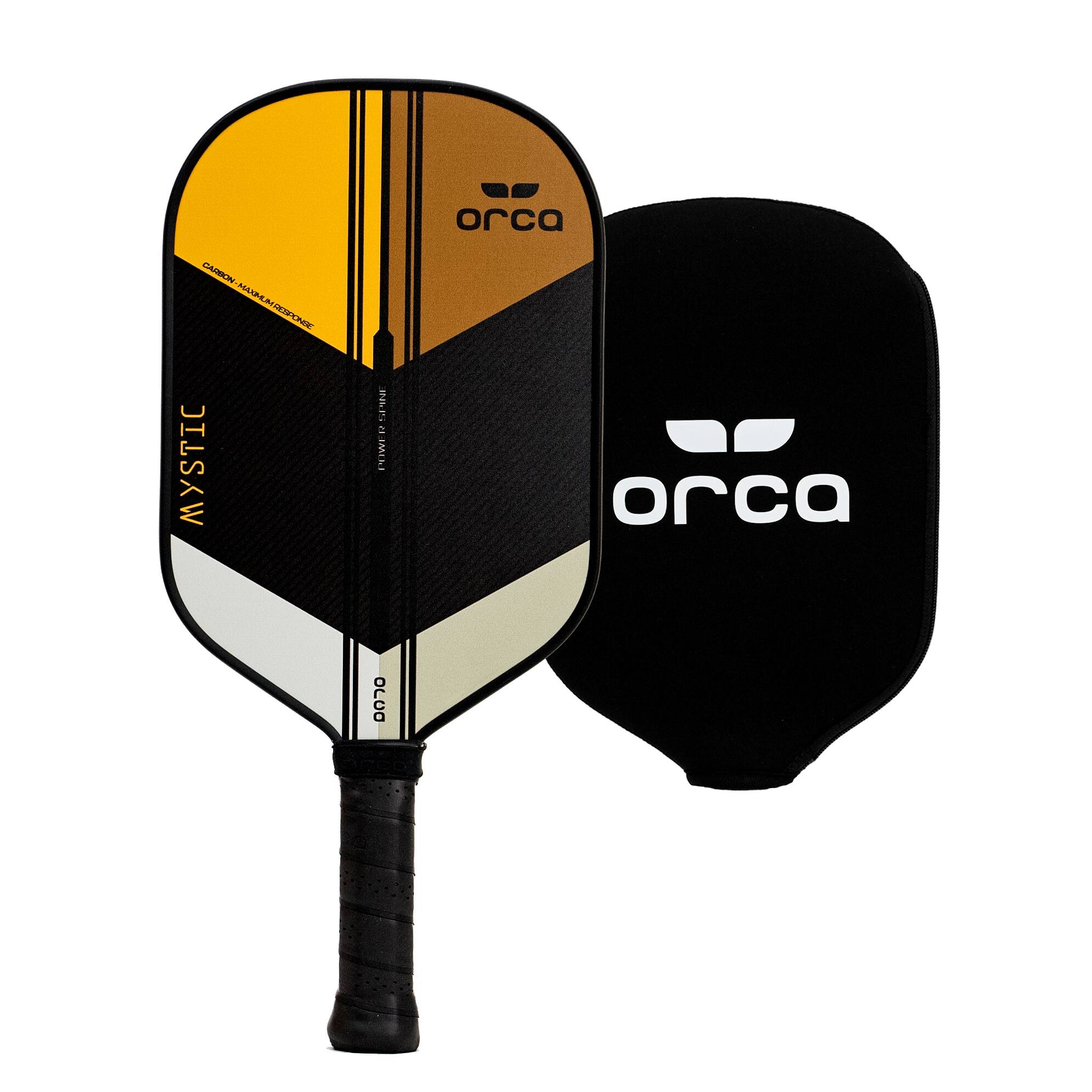 The image features a yellow and black tennis racket with the word "orca" on it. The racket is placed next to a black case, which also has the word "orca" on it. The case is designed to protect the racket when it is not in use.