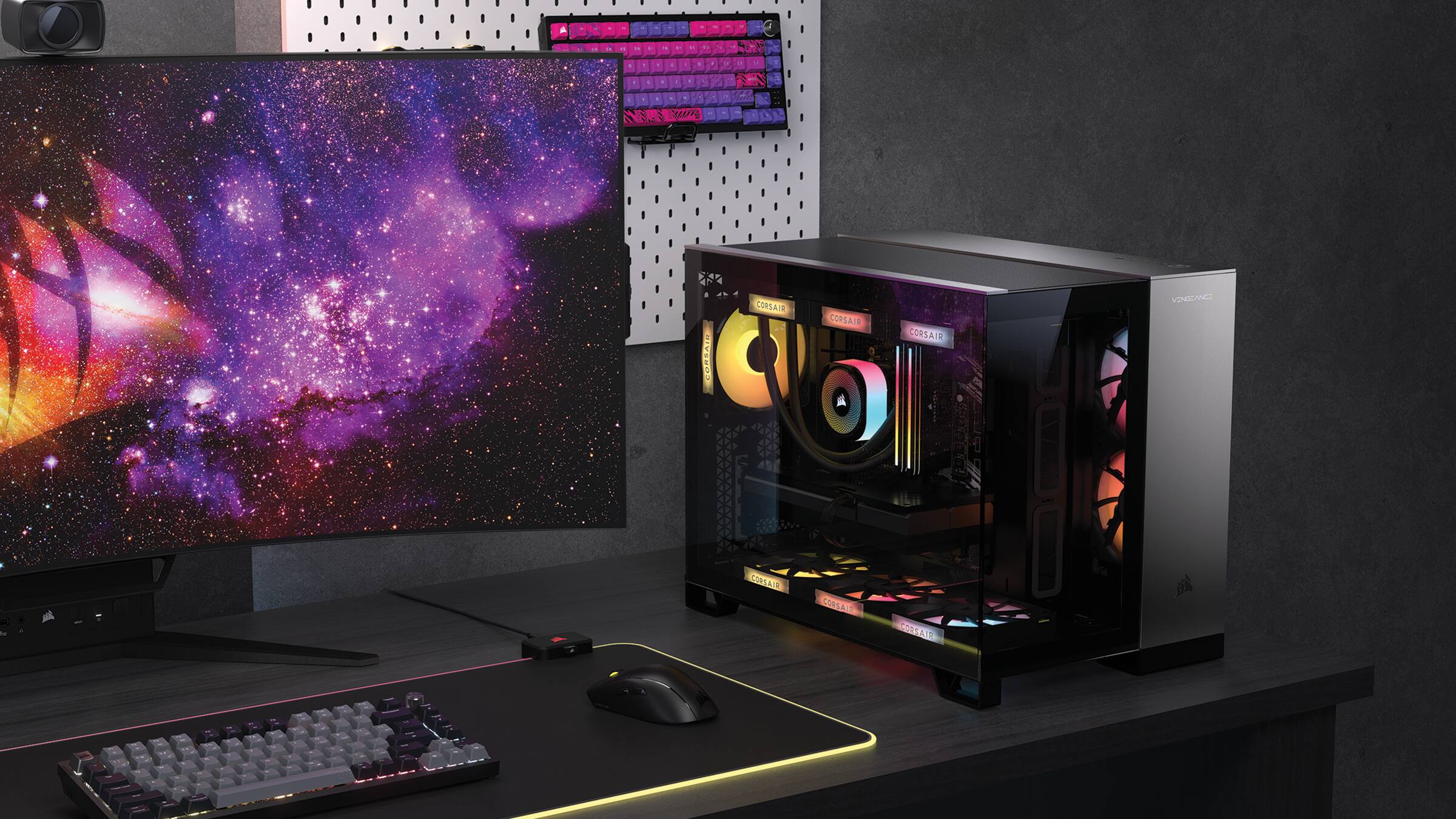 A Corsair computer monitor is sitting on a desk.