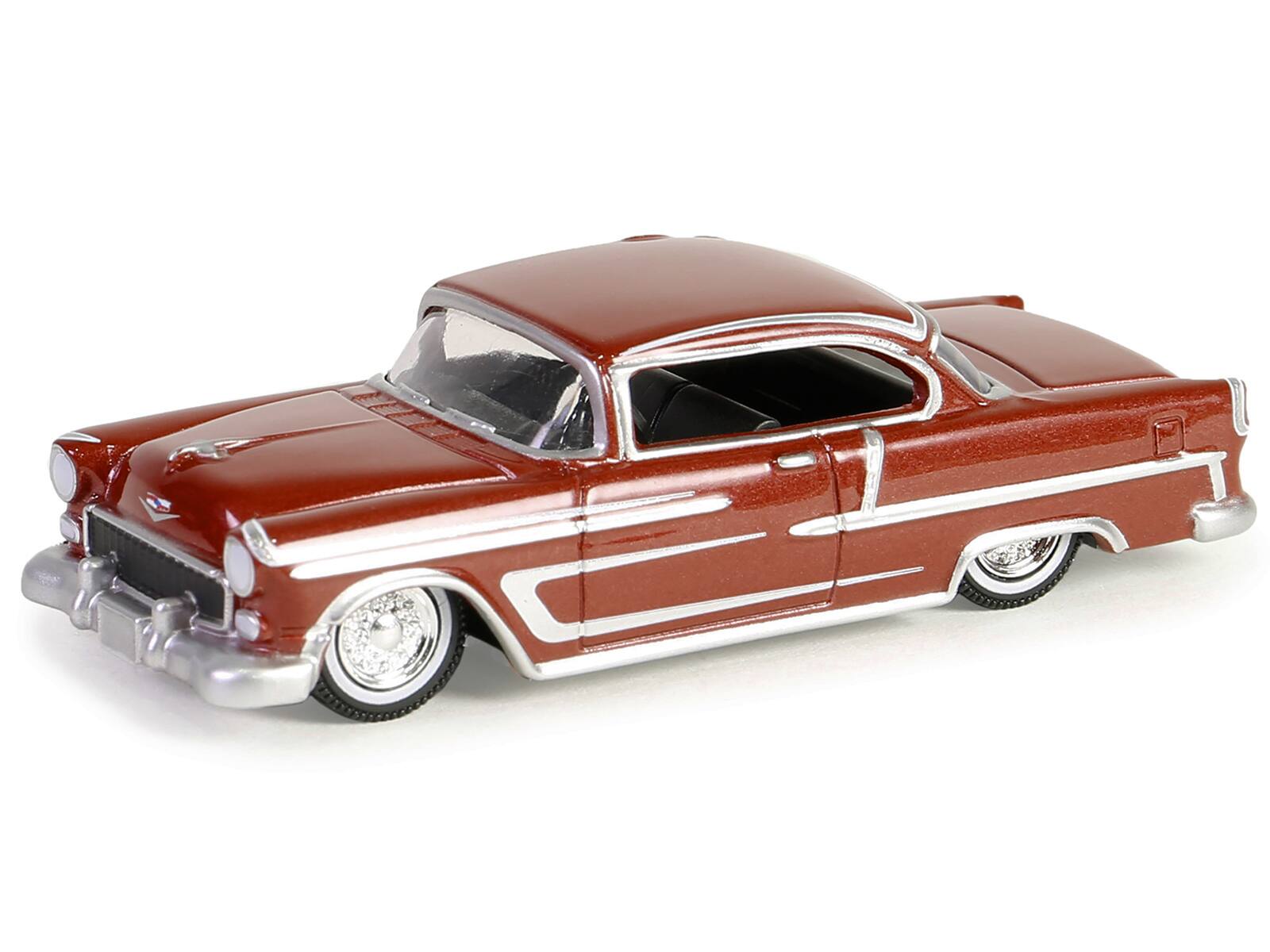 Angle. Greenlight - 1955 Chevrolet Bel Air Lowrider Red Metallic and Silver "California Lowriders" Series 5 1/64 Diecast - Red Metallic And Silver.