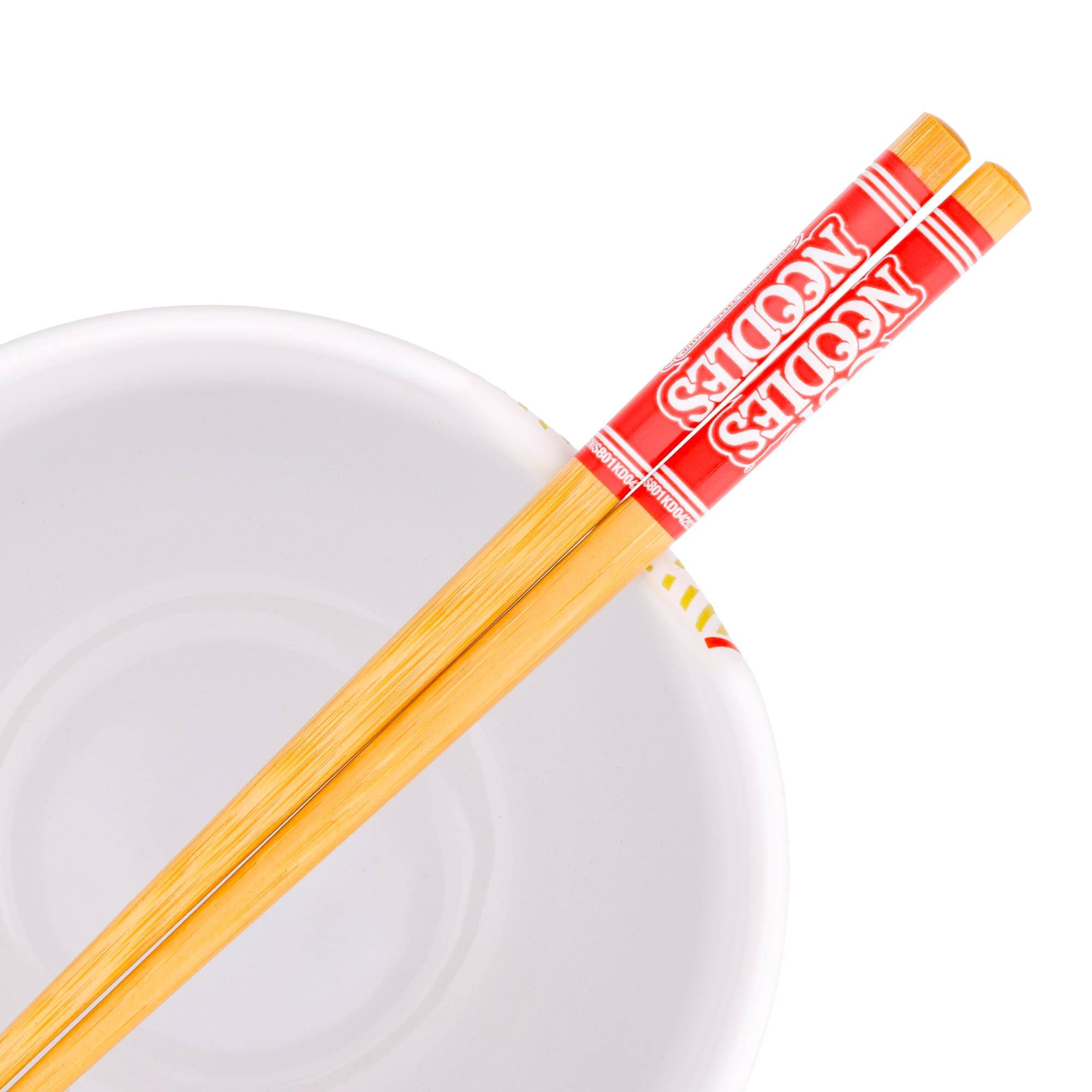 The text on the image reads:

"NOODLES
NOODLES"

The text you provided seems to be a mix of different codes or identifiers. Here is the corrected and grouped text:

- II NOODLES
- S801KD04
- S801KDO4
- 6801
- 5801KDO