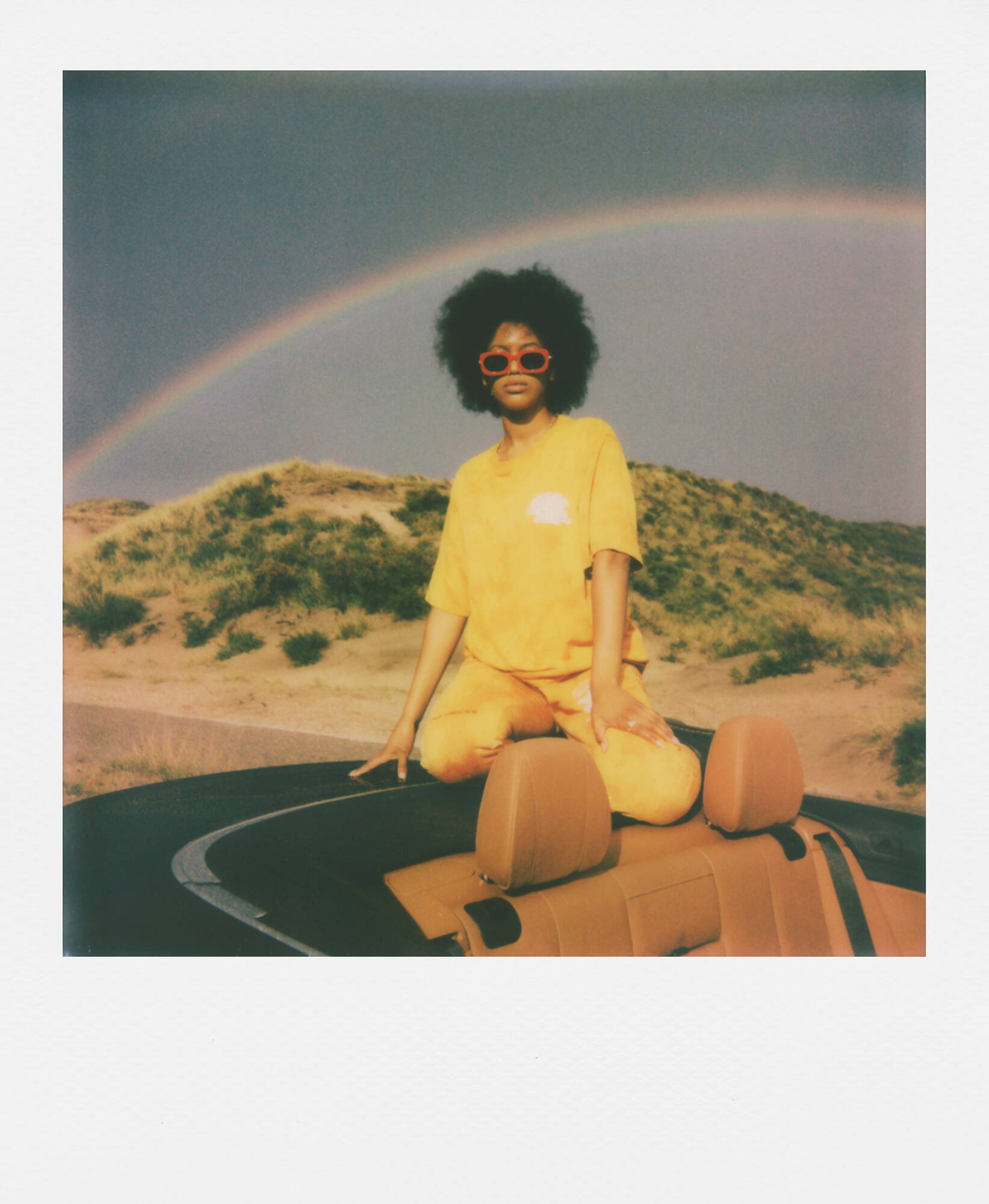 Left. Polaroid Originals - Polaroid GO Instant Camera Everything Box Bundle with Go Film and Keepsake Kit.