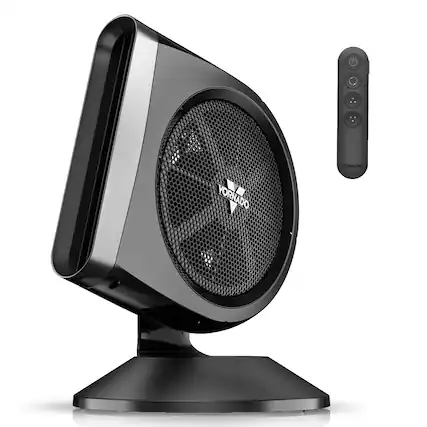 The image features a black Yornado Vornado computer speaker and a black computer monitor. The speaker is placed on a stand, and the monitor is positioned next to it. The setup appears to be a desktop computer setup, with the speaker providing additional sound quality to the user's experience.