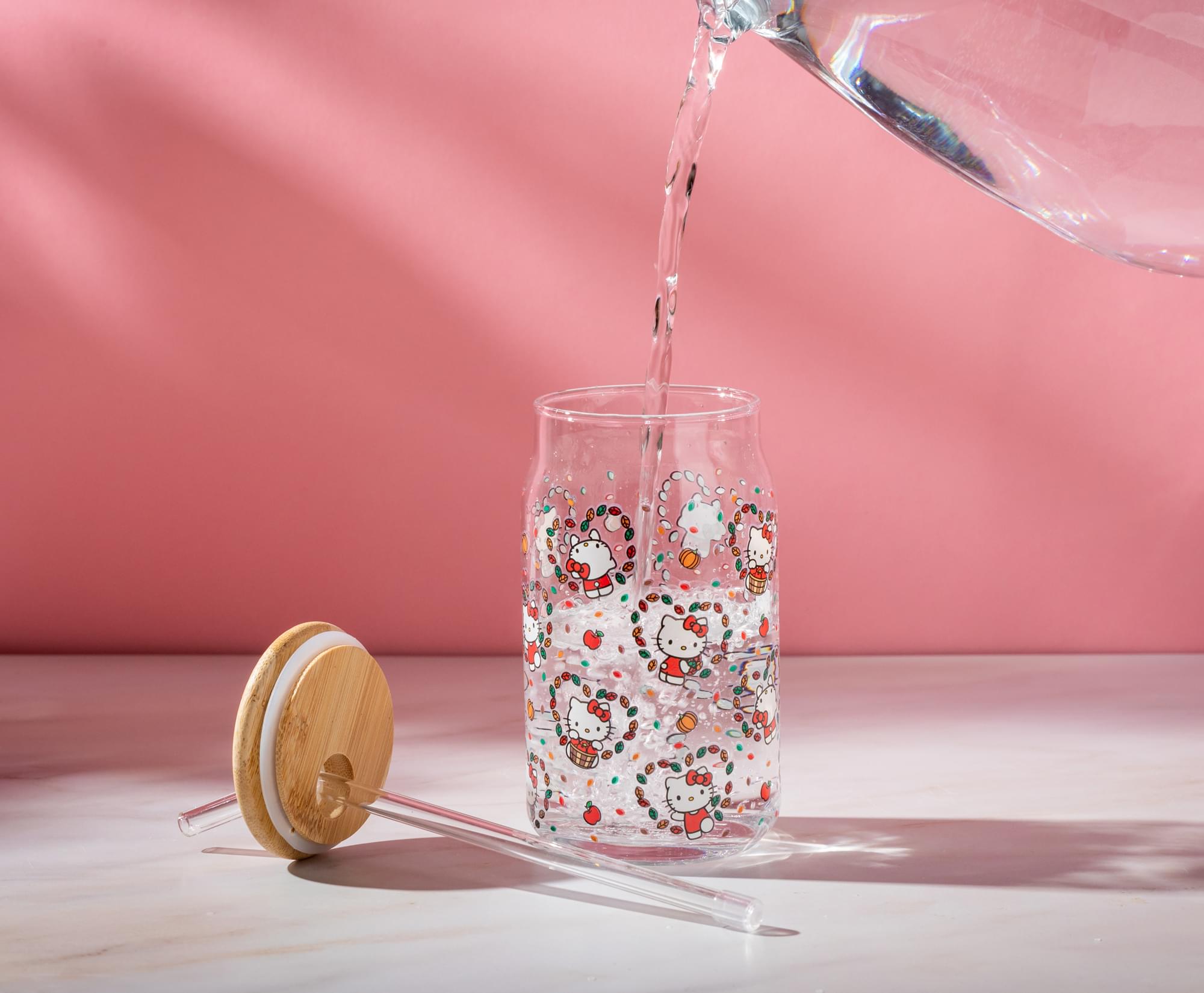 Alt View 5. Silver Buffalo - Sanrio Hello Kitty Fall Leaves 16-Ounce Glass Tumbler With Bamboo Lid and Straw - White.